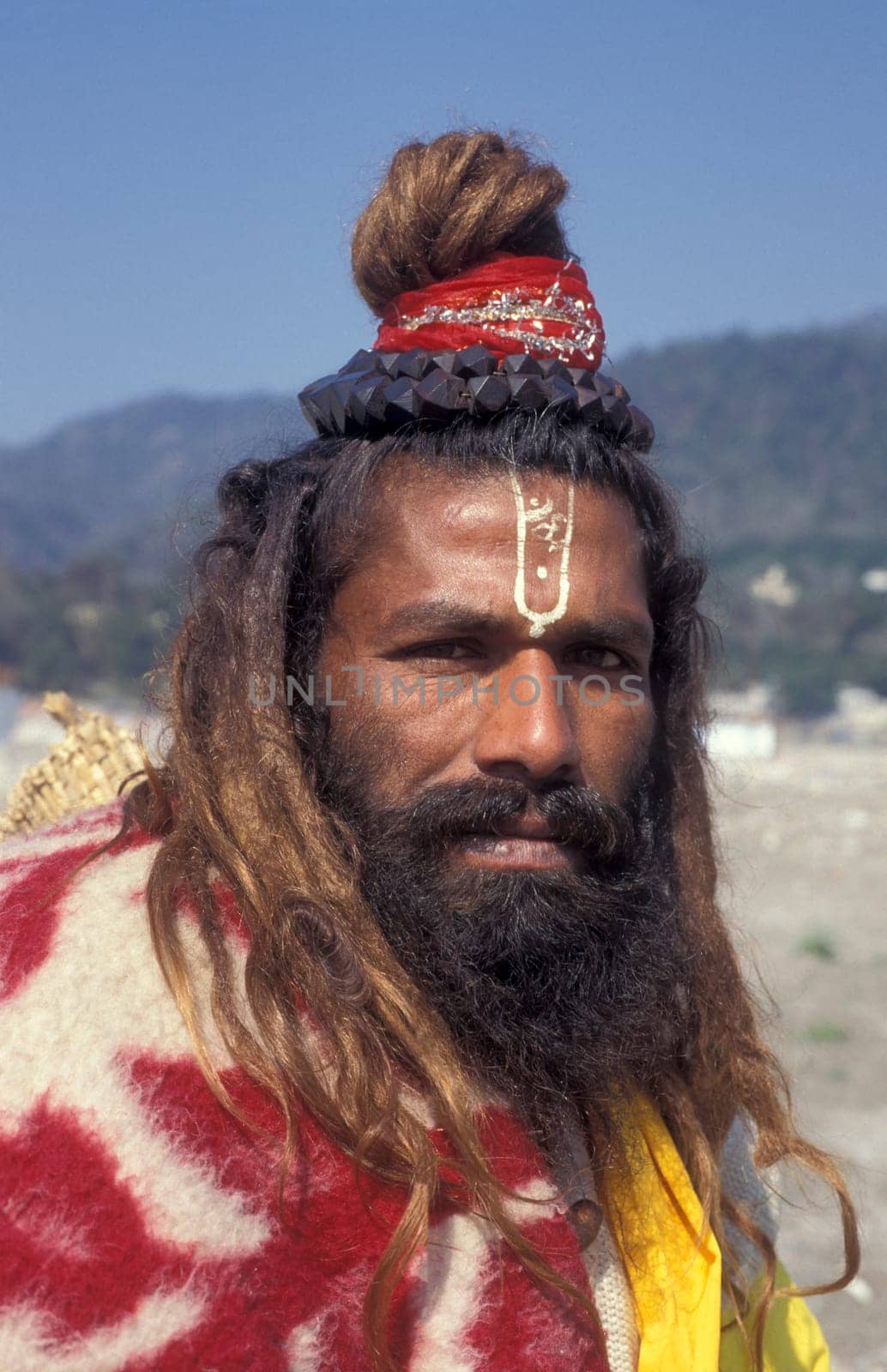 a Holy men and Street Sadhus at the Holy Ganges River in the city of Rishikesh in the Province Uttarakhand in India.  India, Rishikesh, February, 1998