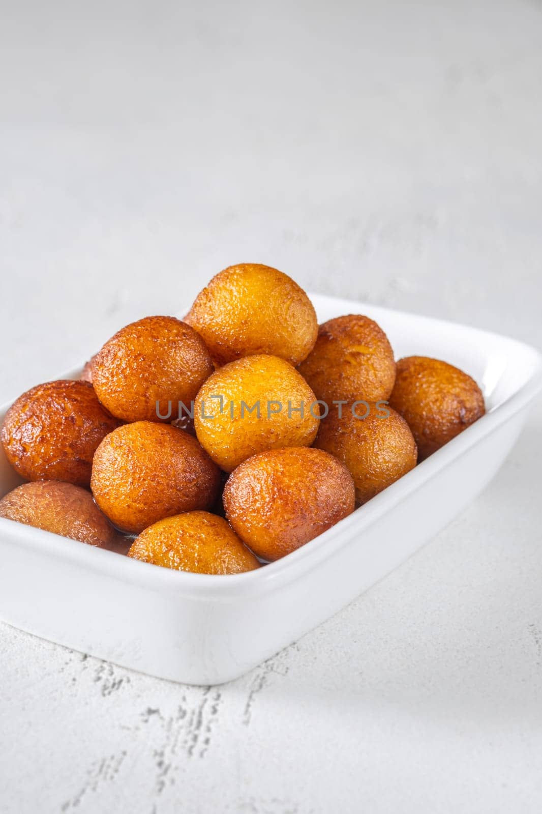 Gulab jamun indian dessert soaked in syrup