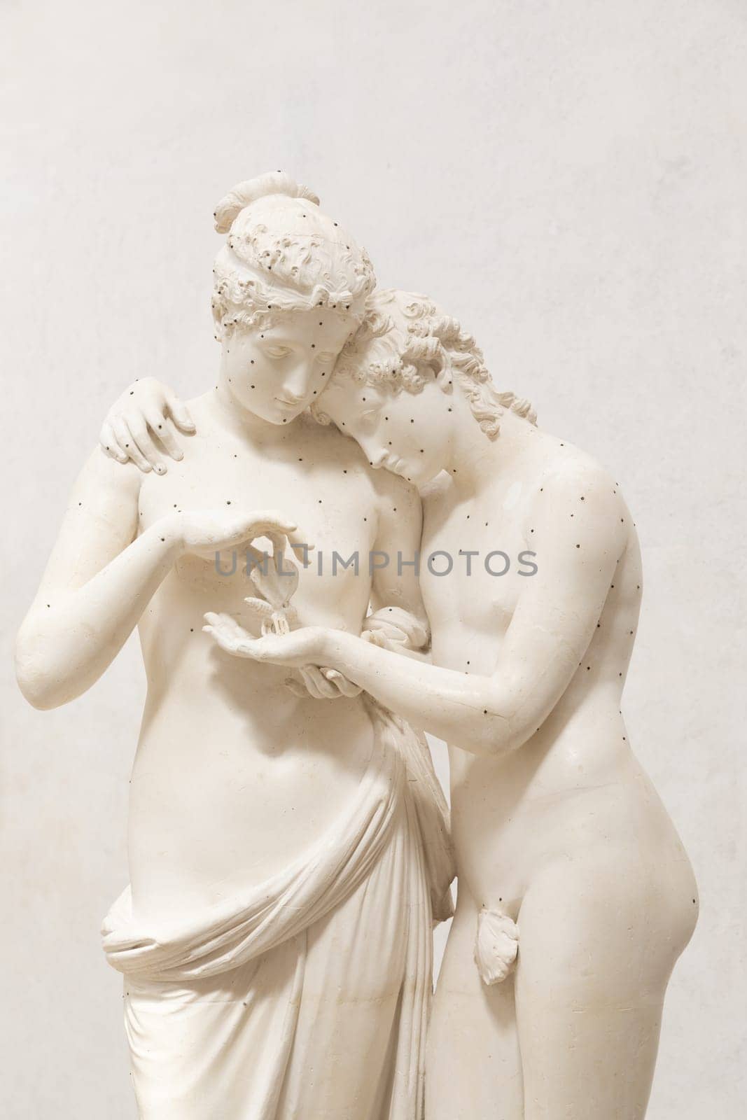 Possagno, Italy - 29 June 2023: Cupid and Psyche statue by sculptor Antonio Canova, 1800. Sensual hug, love and togetherness emotion.