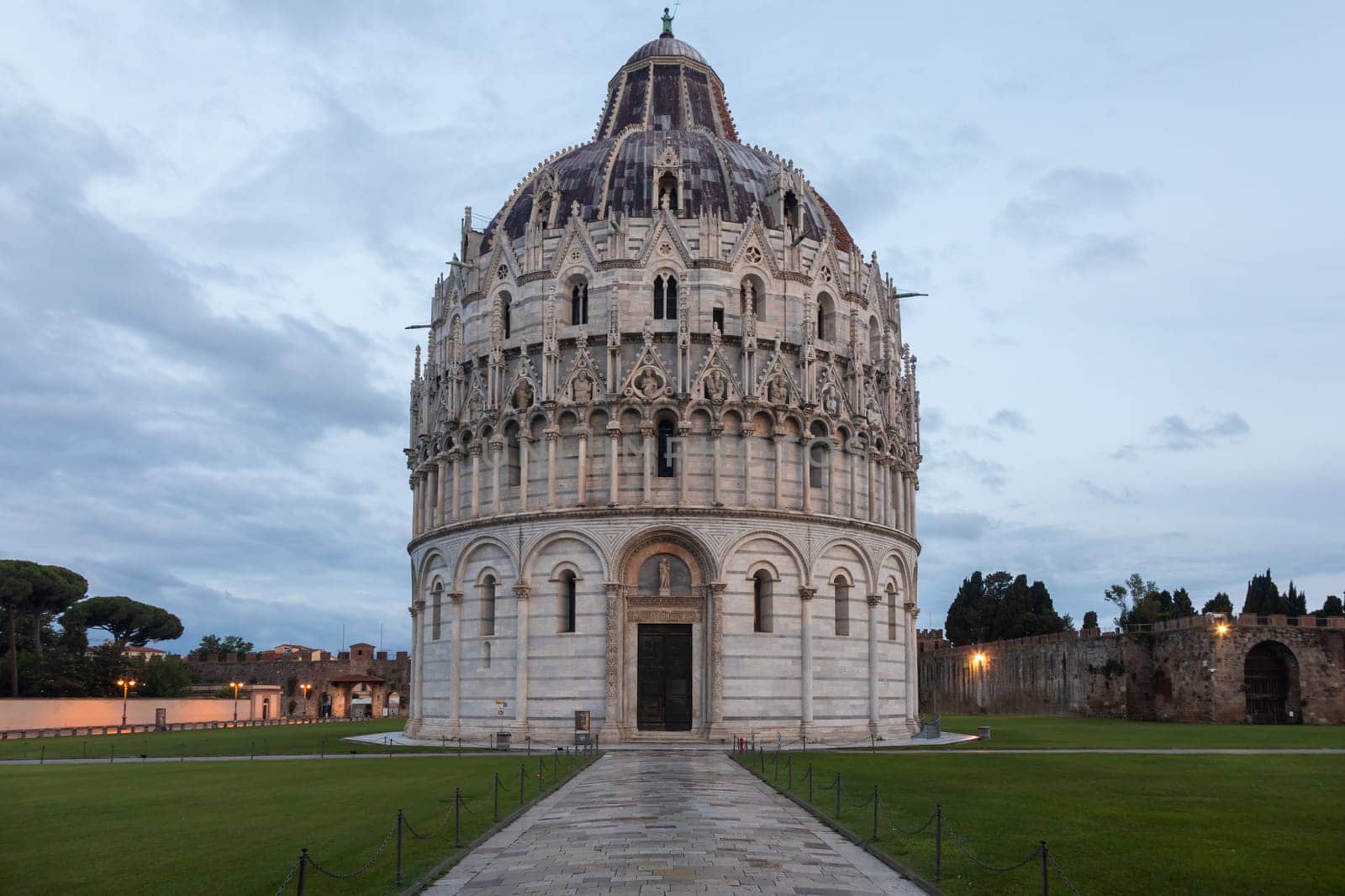 Pisa, Italy - 29 June 2023: cathedral sightseeing, travel destination, sunrise light, famous artistic building
