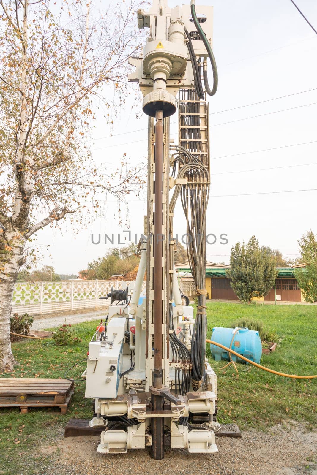 Water well drill. Industrial machinery drilling with mining tower. Engineering equipment