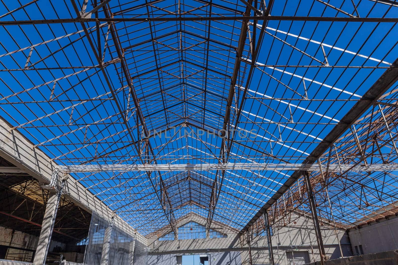 Abandoned warehouse in ruins in Lisbon, harbour area. Portugal