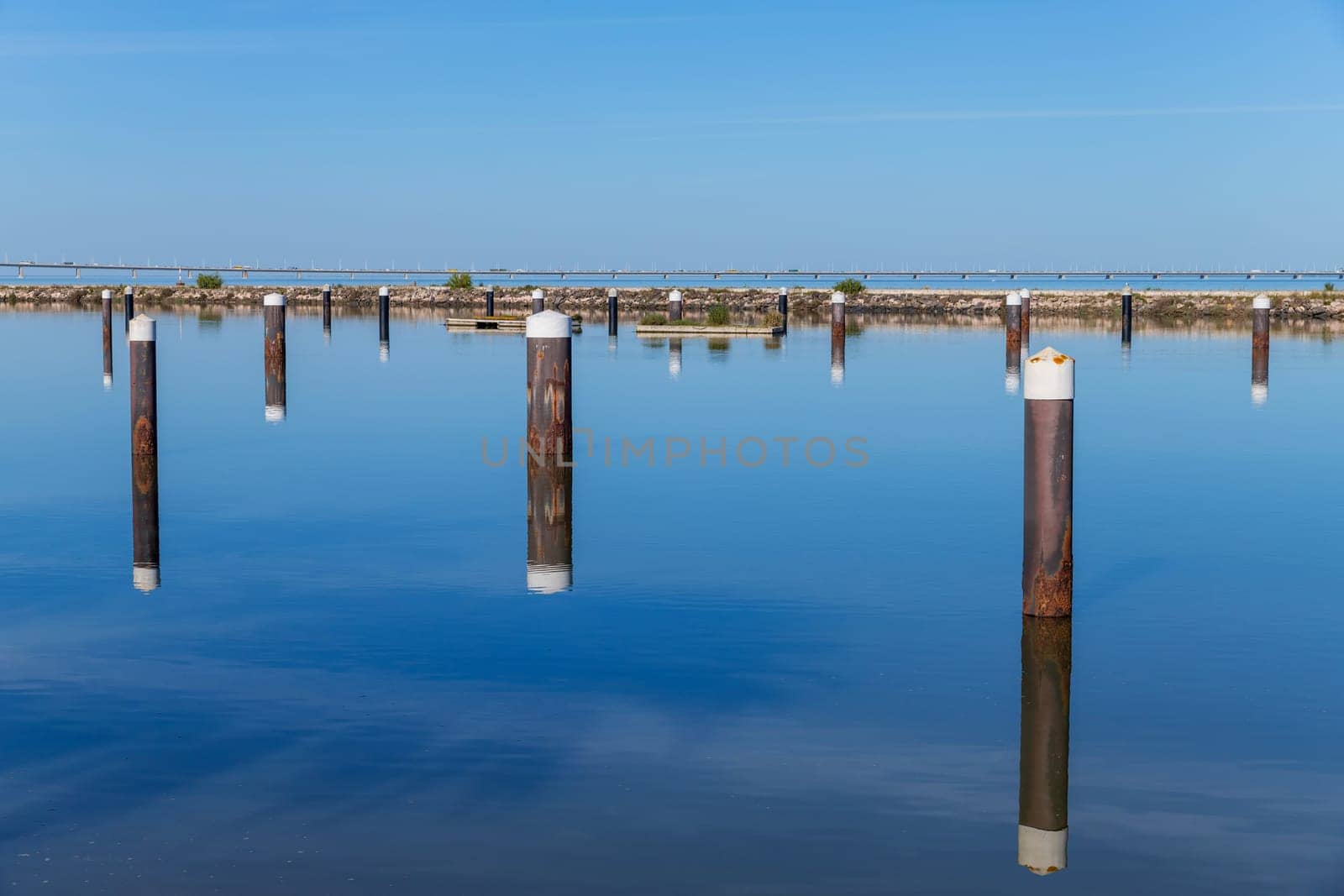 Pier with view on Vasco da Gama bridge on the Tejo river. Lisbon, Portugal.
