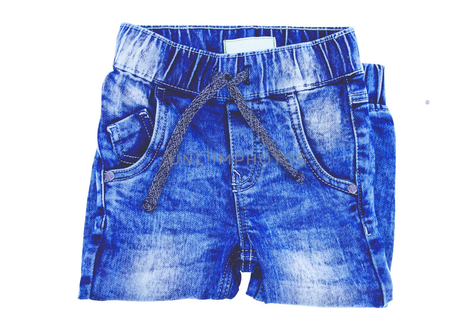 Jeans isolated. Trendy stylish blue denim pants or trousers for child boy isolated on a white background. Clipping path. Jeans winter and autumn fashion.