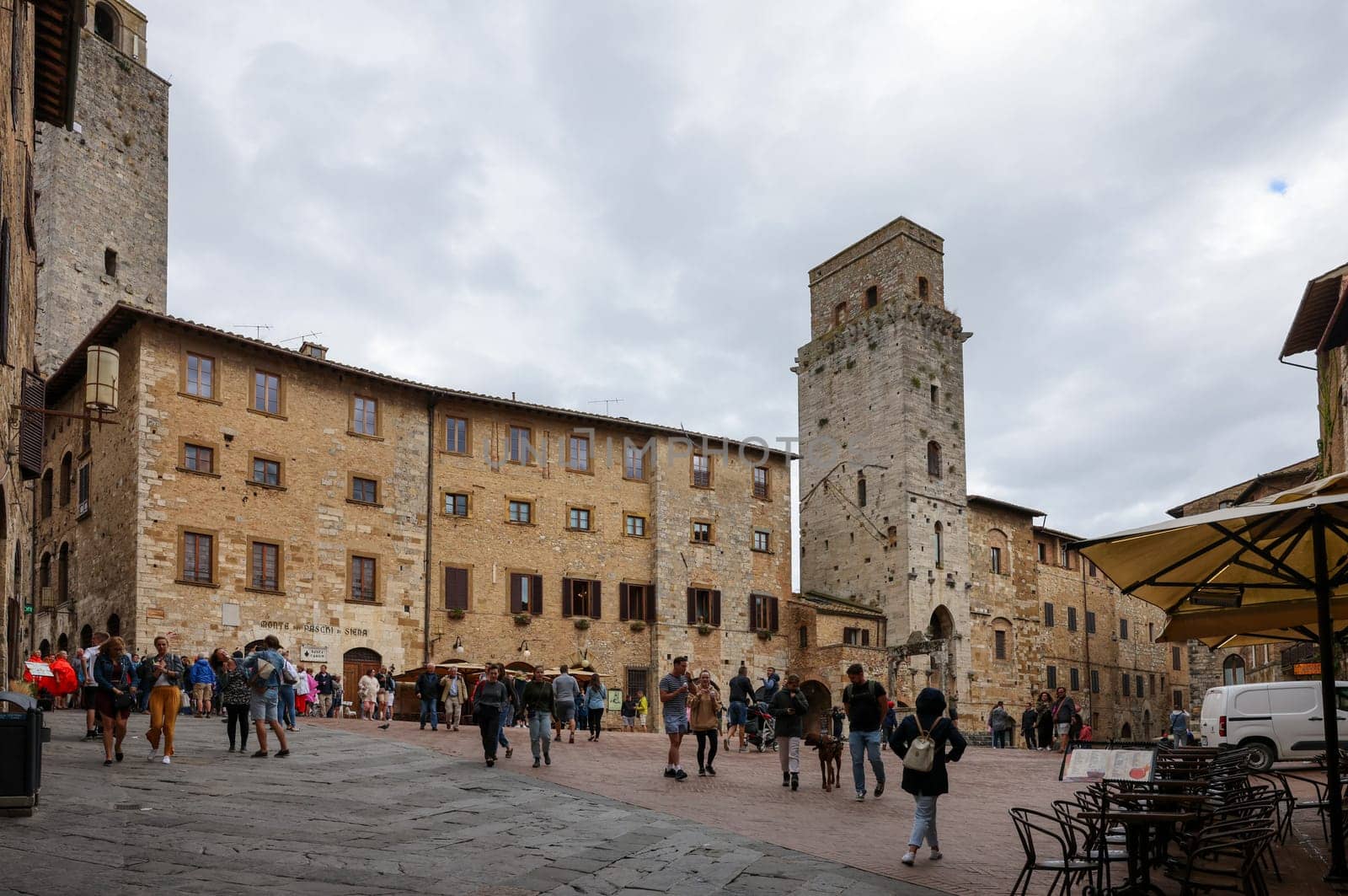 San Gimignano, Italy - Sept 17, 2022: Piazza della Cisterna in San Gimignano, Tuscany, Italy