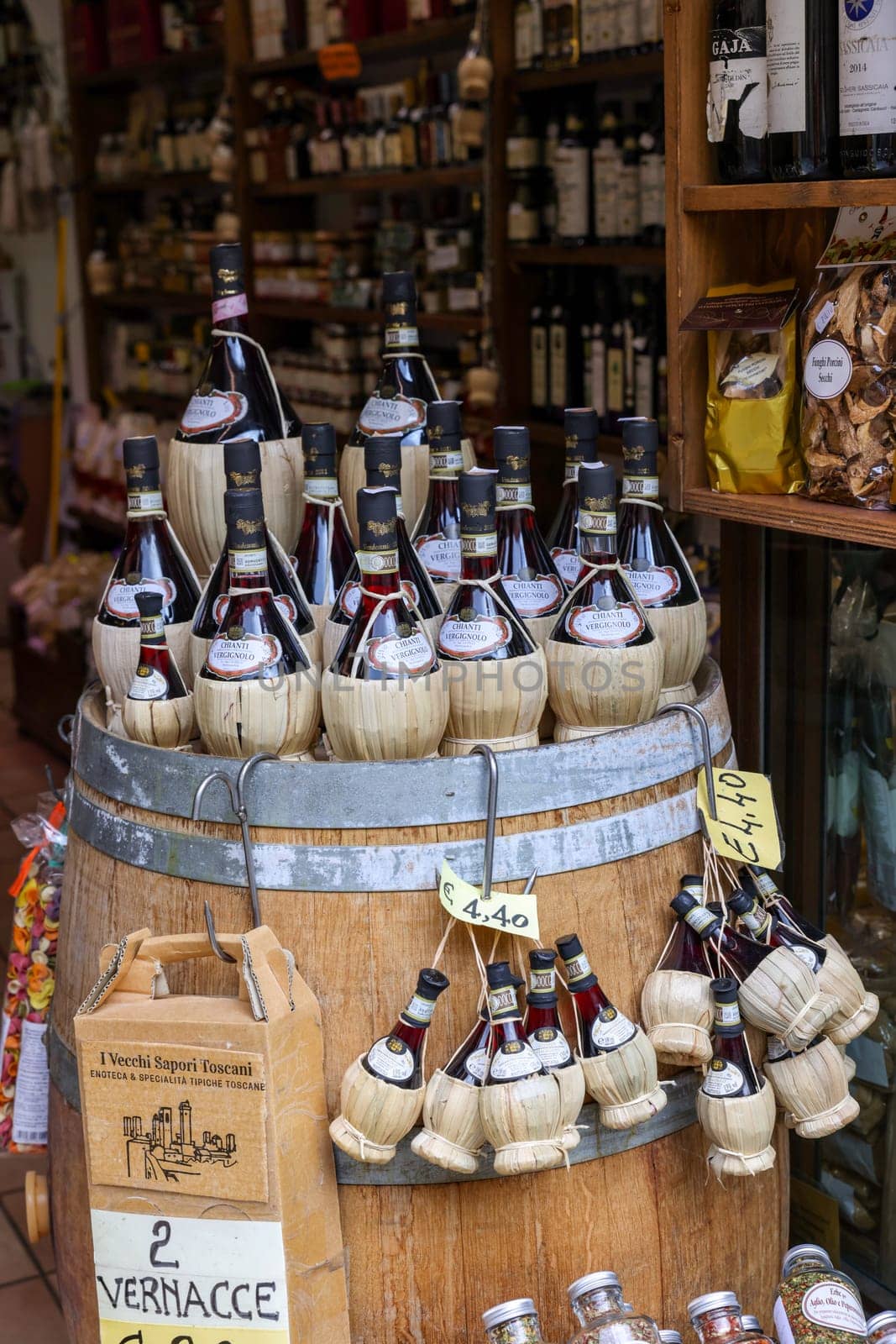 San Gimignano, Italy - Sept 17, 2022: A shop selling local and typical italian produce in the historic center of San Gimignano, Tuscany.