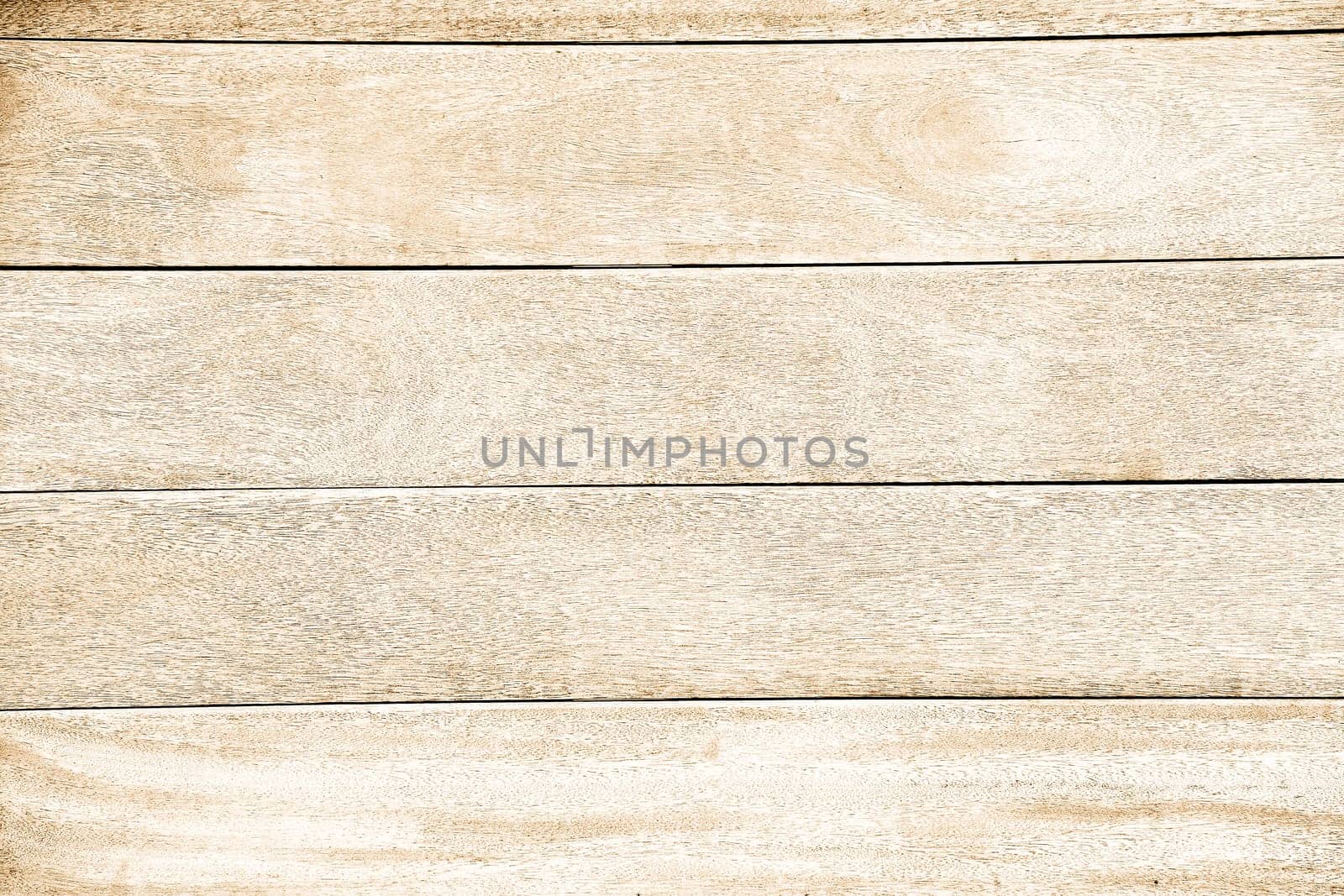 Light-colored wooden boards with a smooth surface and a visible fiber pattern, arranged horizontally, background image
