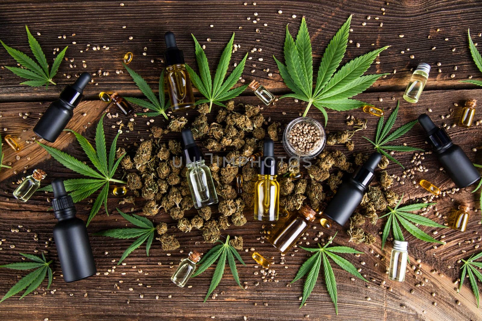 Cbd oil and marijuana plant, hemp seeds, medical marijuana concept