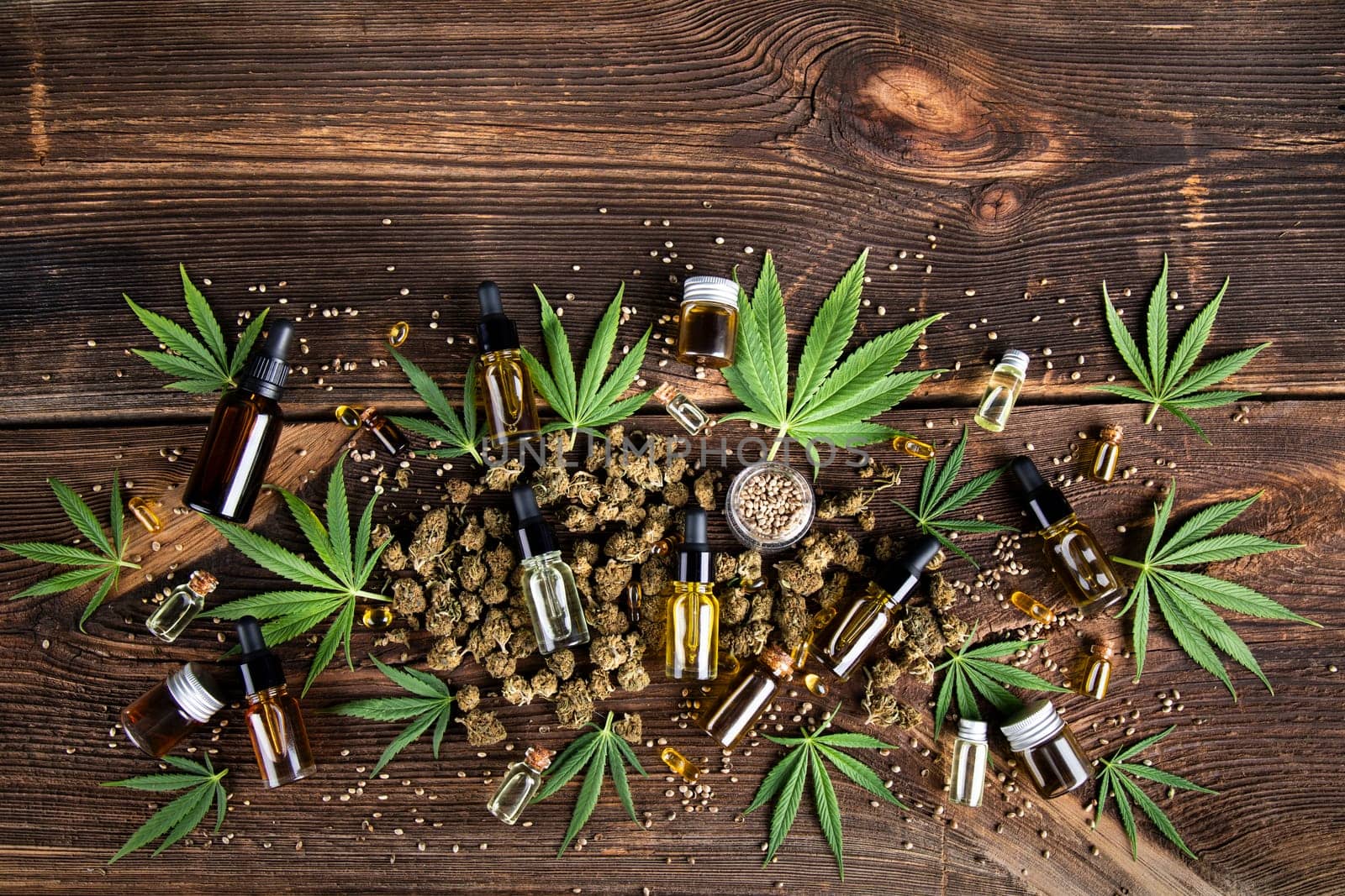 Cbd oil and marijuana plant, hemp seeds, medical marijuana concept