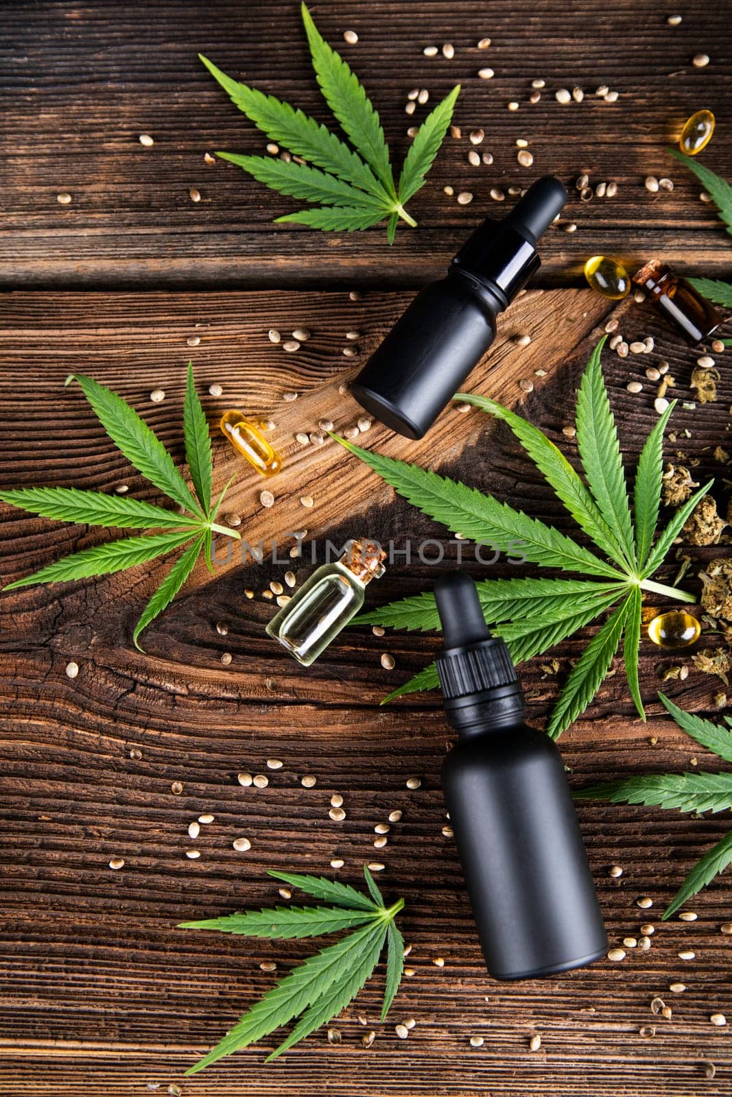 Cbd oil and marijuana plant, hemp seeds, medical marijuana concept
