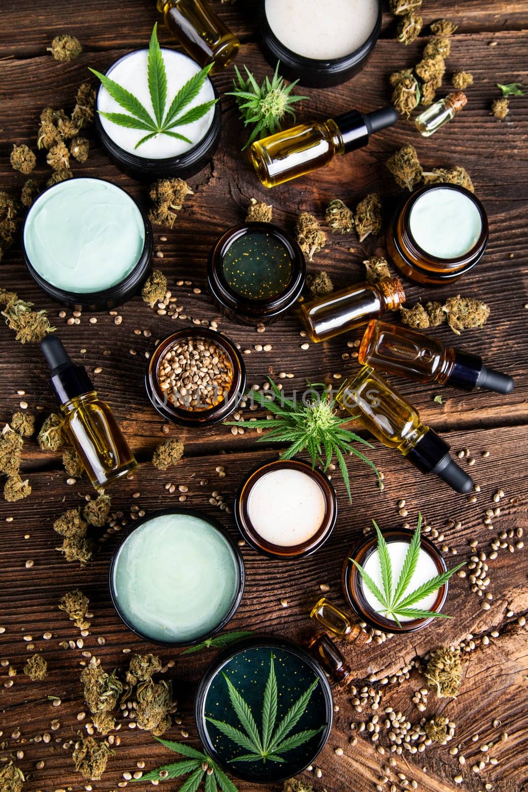 Cbd hemp cosmetics, oil in bottle and marijuana