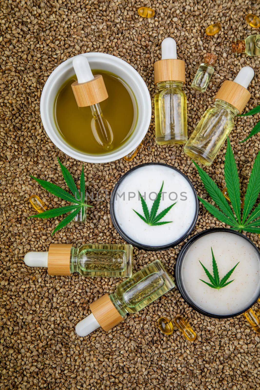 Cbd oil and marijuana plant, hemp seeds, medical marijuana concept
