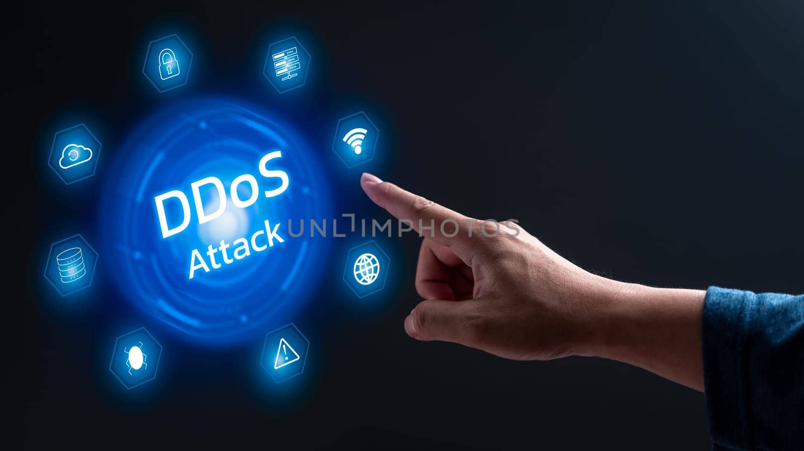 A hand pointing to a blue circle with the word ddos attack in white. The circle is surrounded by various icons, including a light, a cloud, and a globe. Concept of a cyber attack