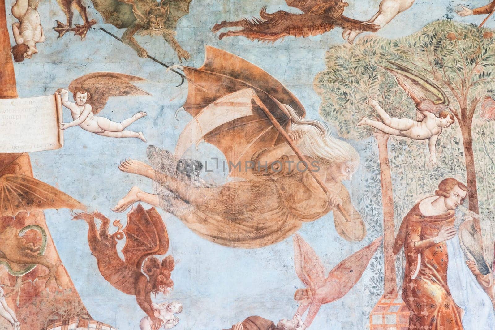 Pisa, Italy - 29 June 2023. Gothic detail in the Inferno fresco, Pisa cemetery, 1336. Medieval scary hell concept.