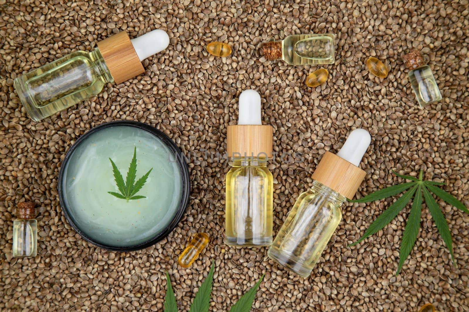 Cbd oil and marijuana plant, hemp seeds, medical marijuana concept