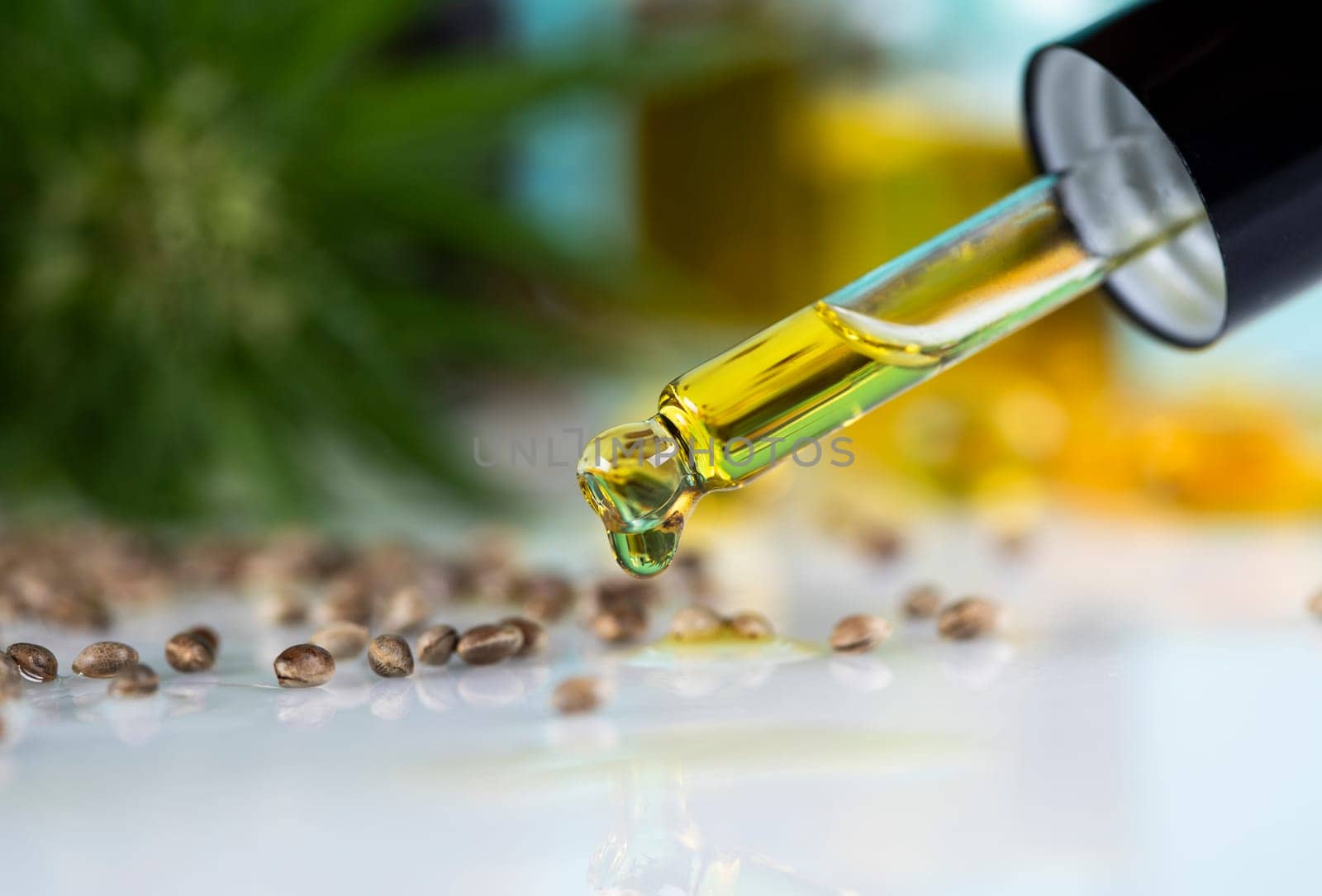 Oil cbd in a glass bottle, with a pipette, Medical marijuana concept