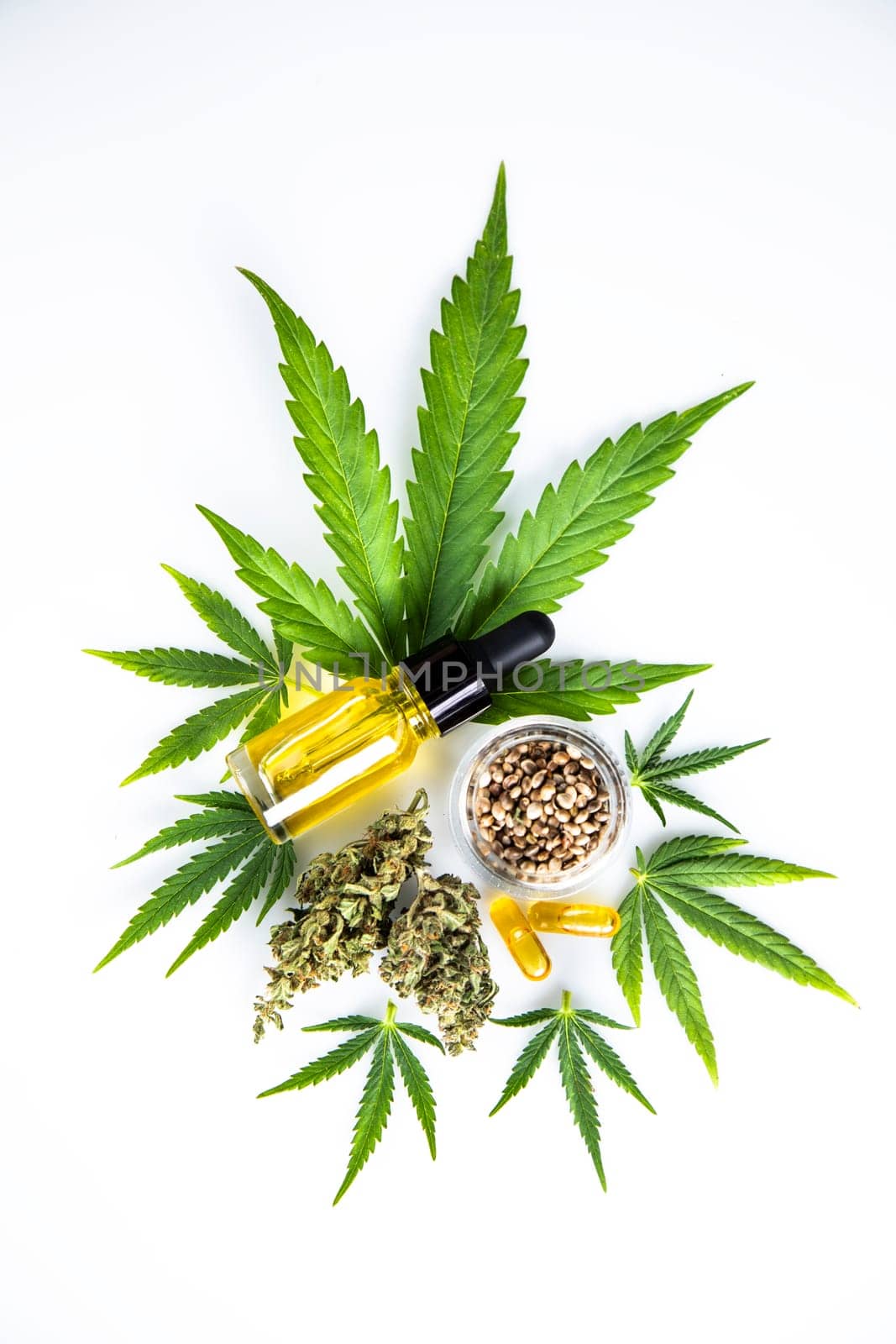 Hemp oil and marijuana leaves on extract cbd