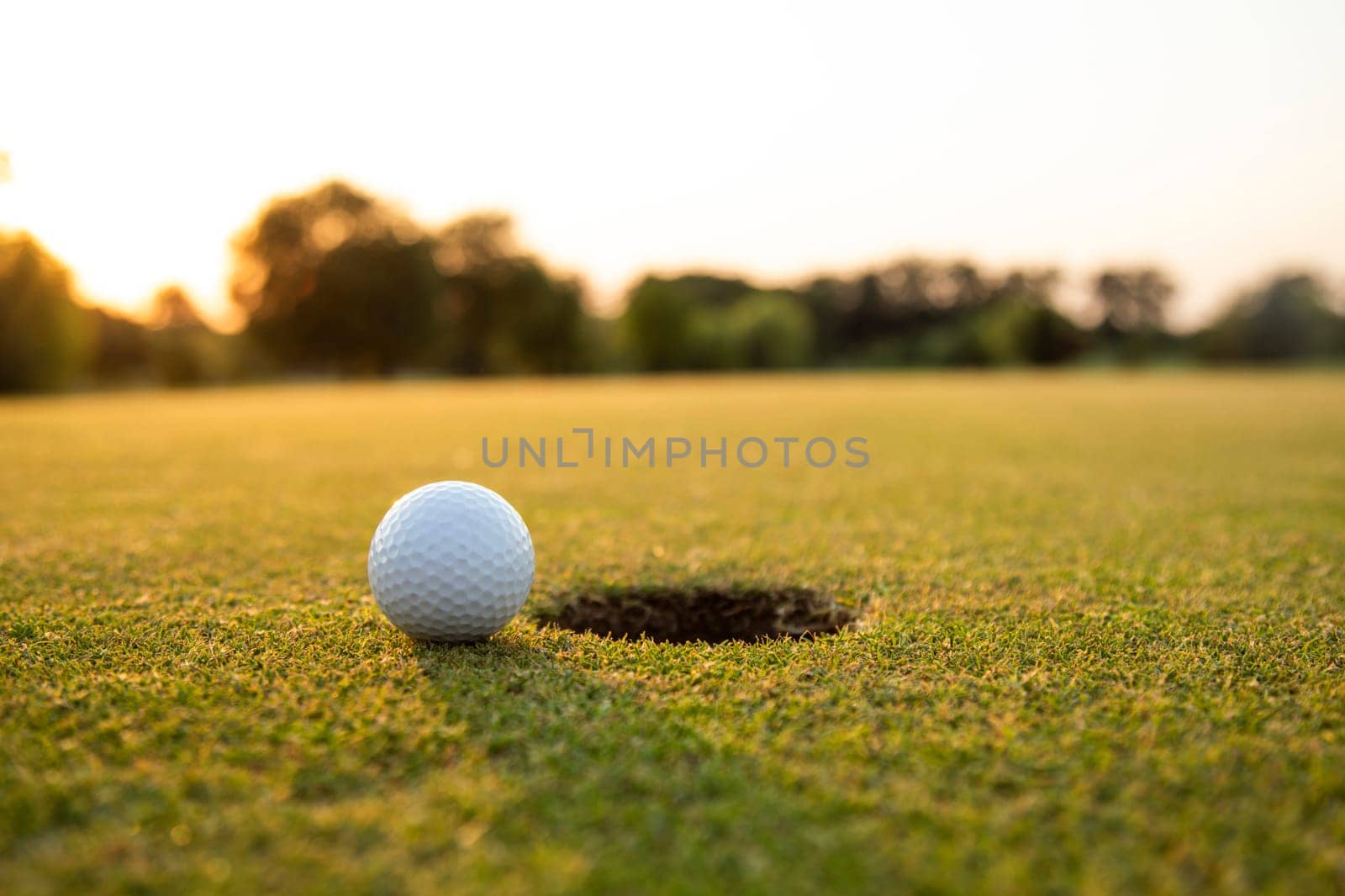 Golf course with ball and grass