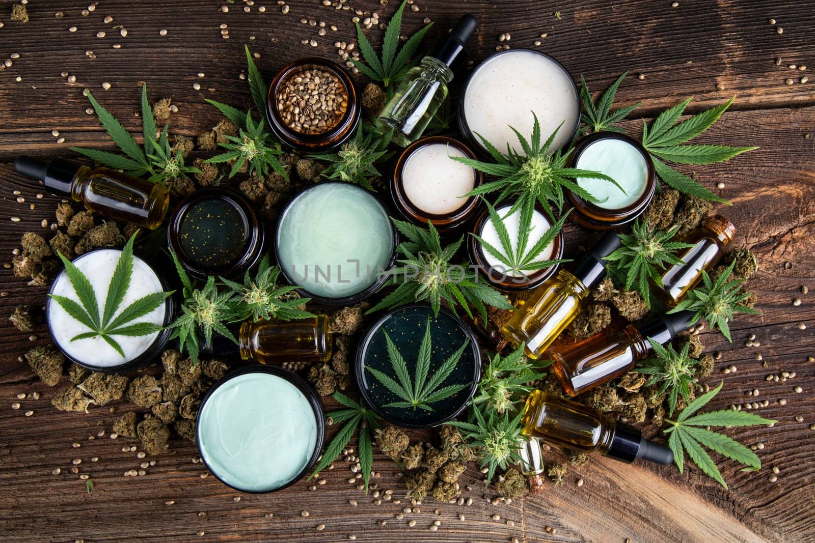 Cbd hemp cosmetics, oil in bottle and marijuana