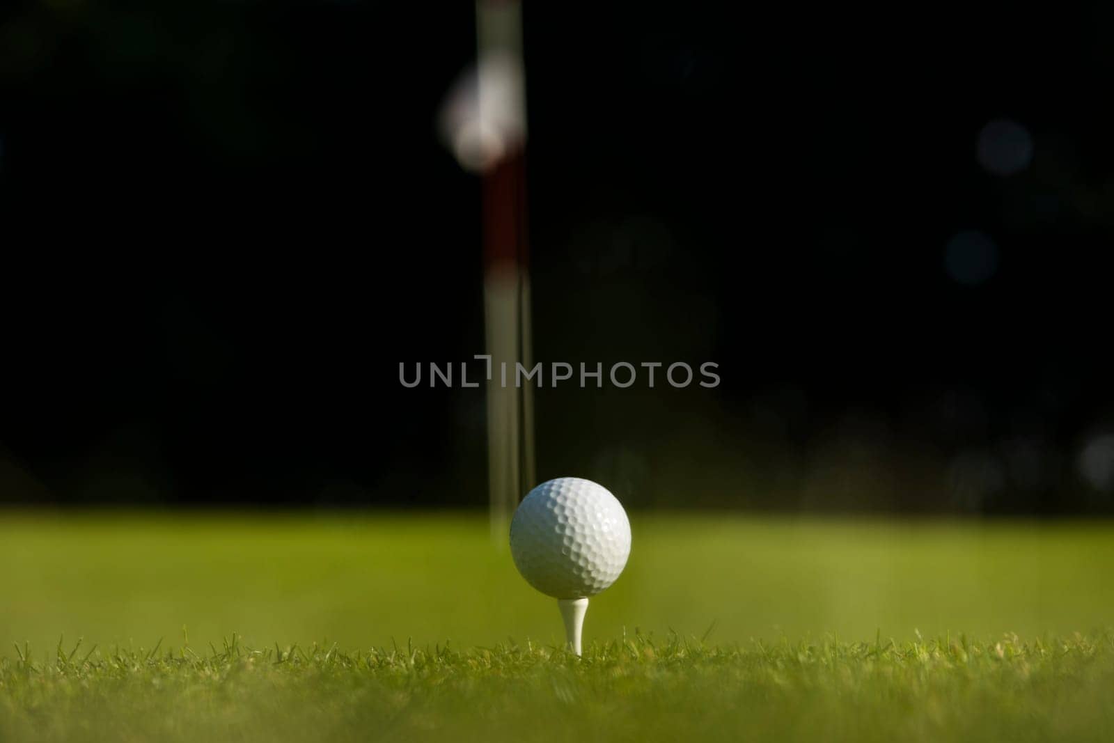 Golf course with ball and grass