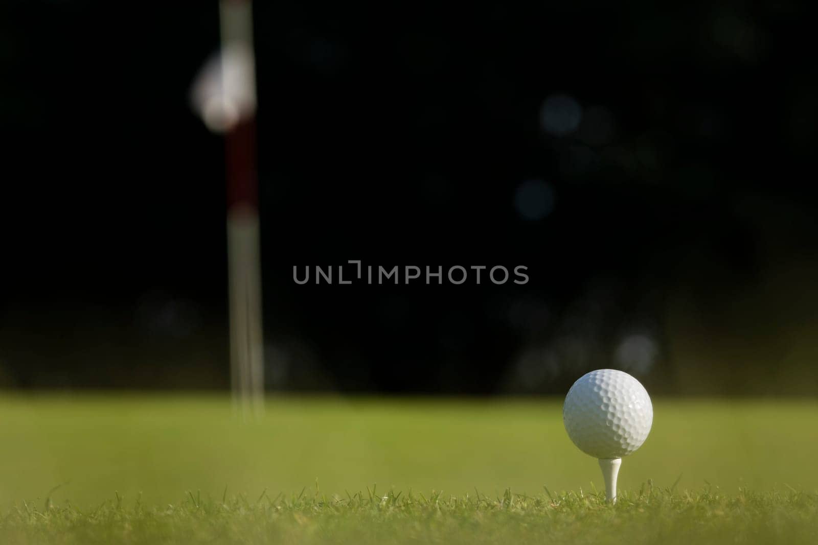 Golf course with ball and grass