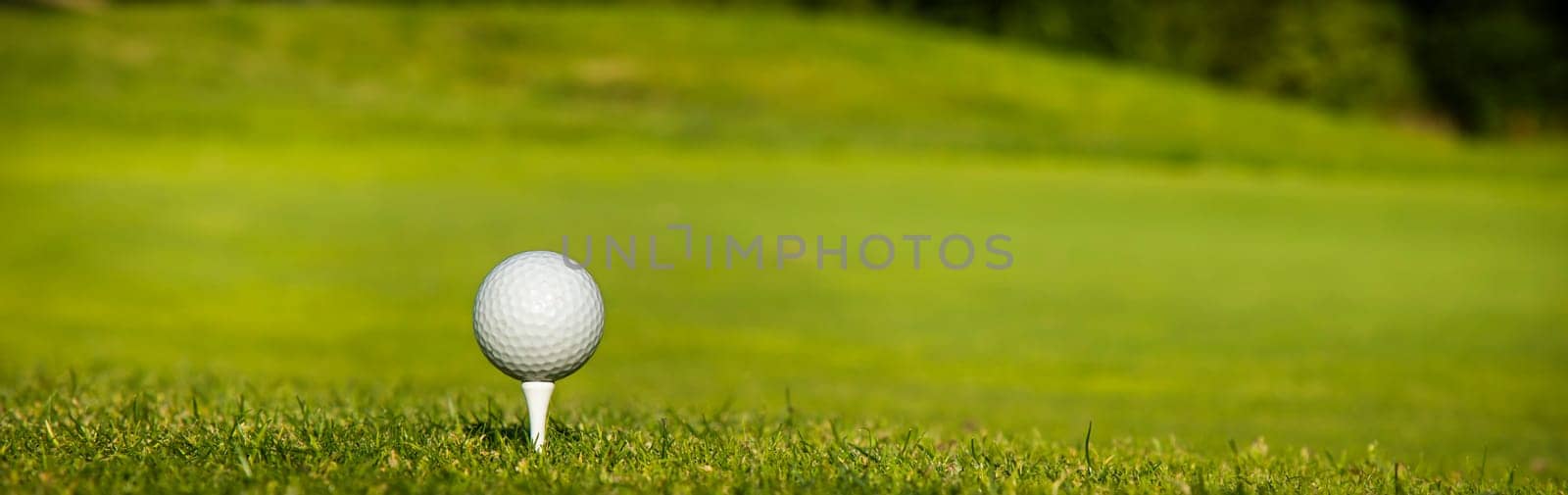Golf course with ball and grass