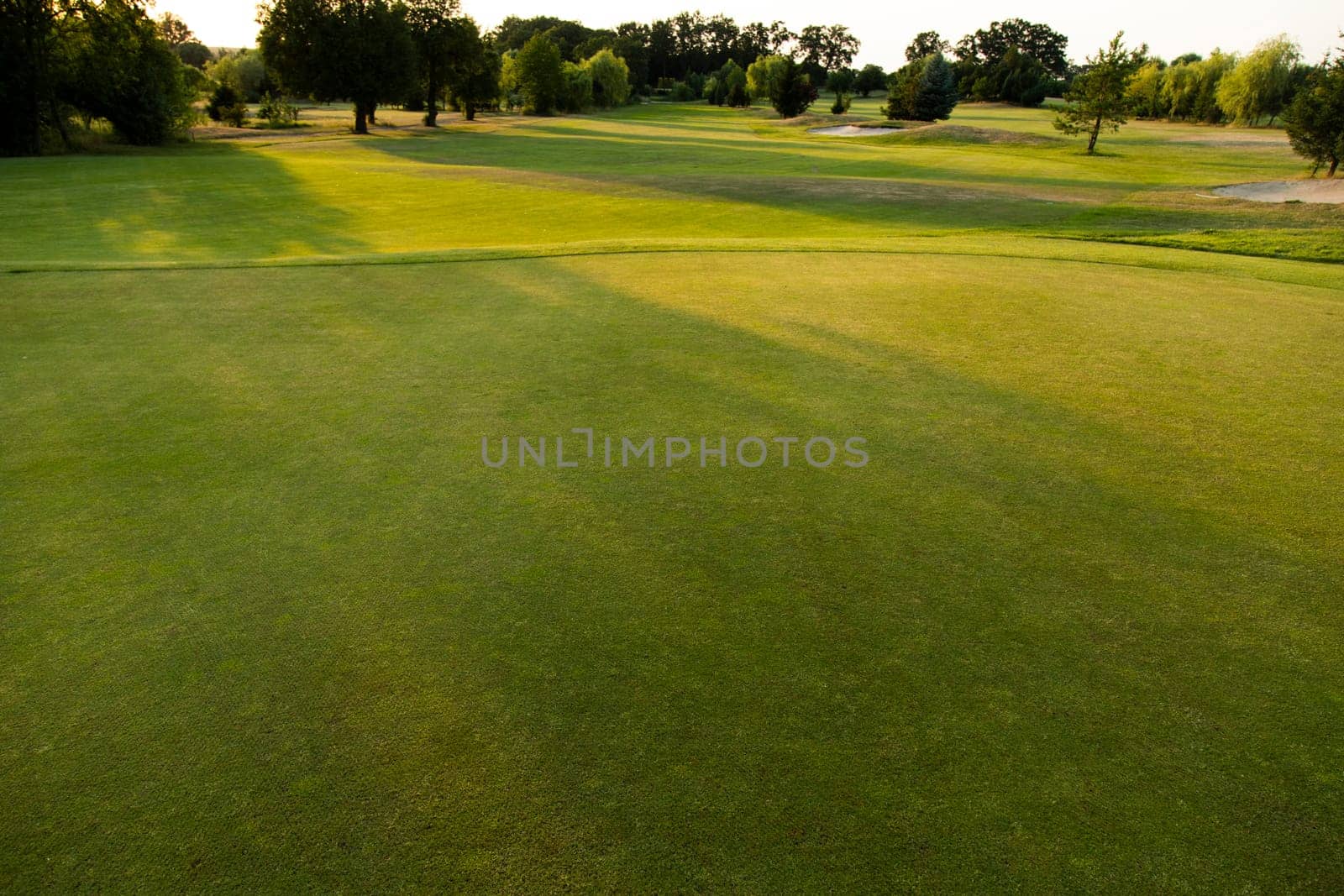 Golf course with green grass