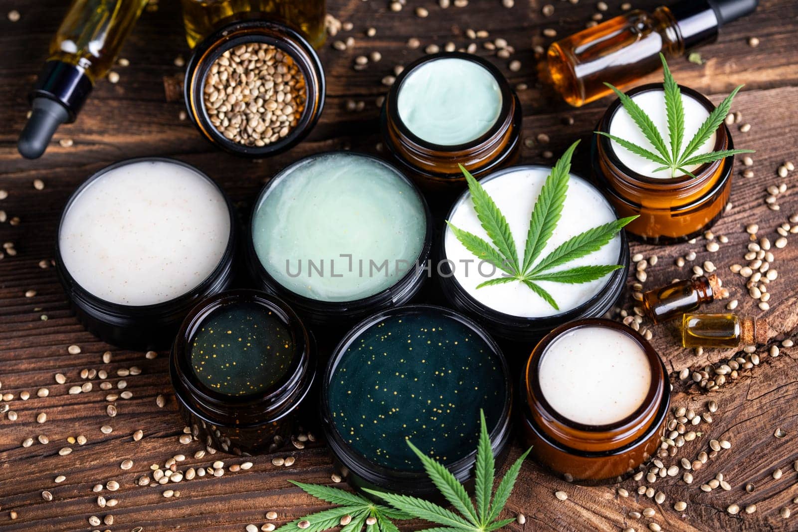 Cbd hemp cosmetics, oil in bottle and marijuana