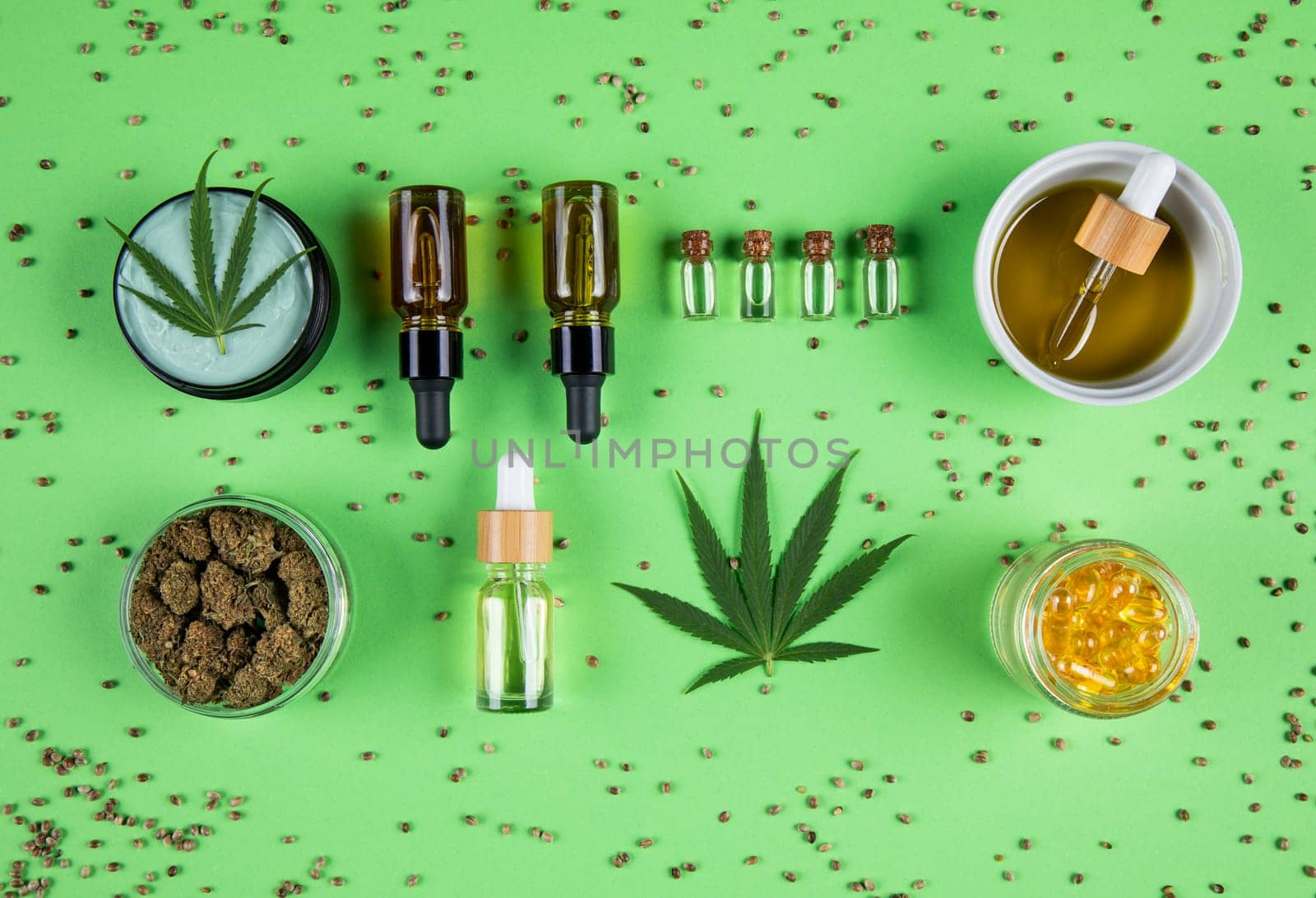 Marijuana buds with cannabis leaves on cbd concept