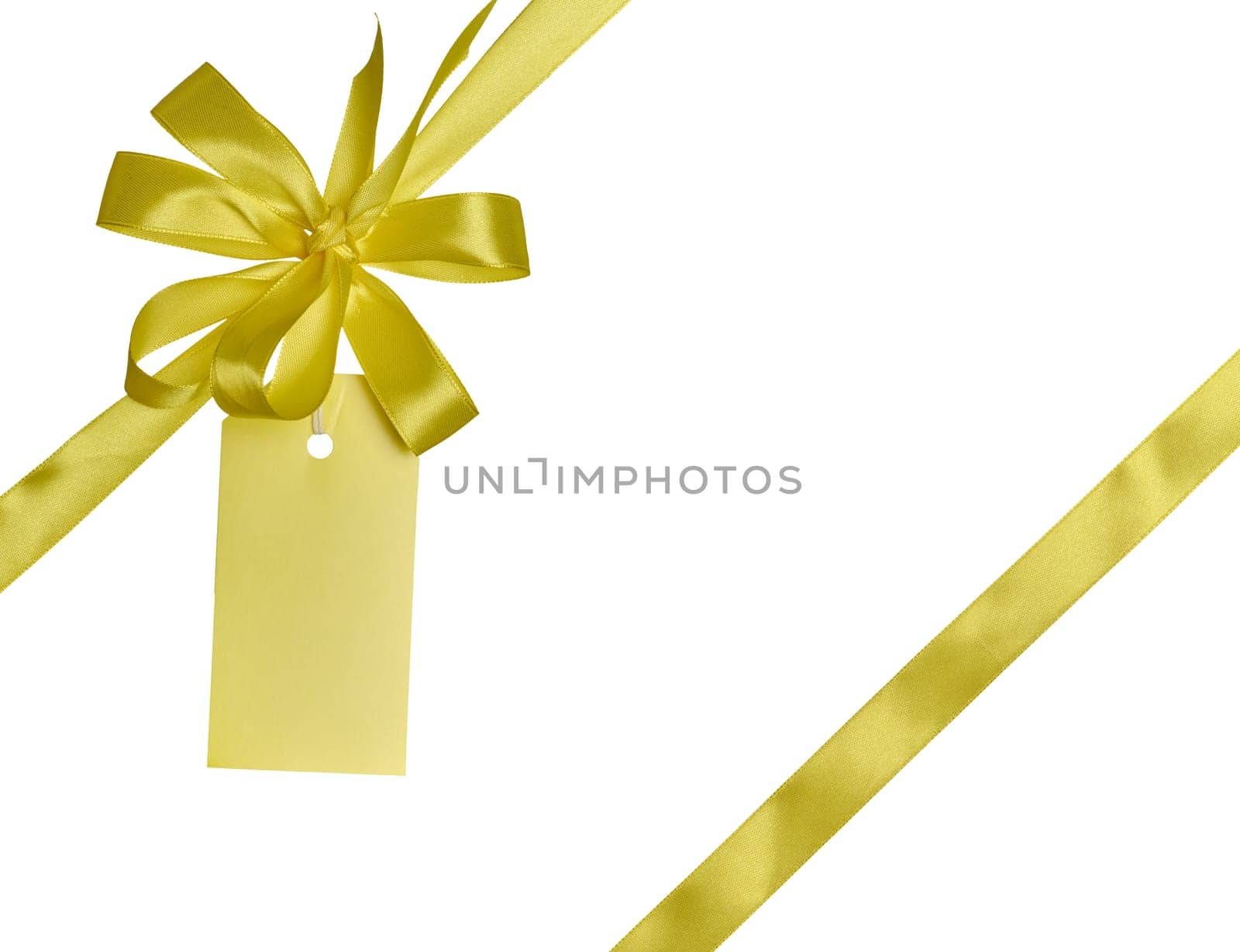 Yellow silk ribbon and bow, yellow paper tag for congratulations. Isolated background