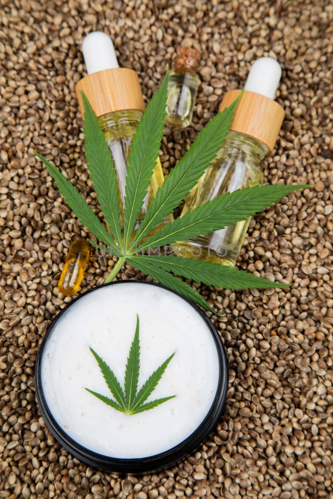 Cbd oil and marijuana plant, hemp seeds, medical marijuana concept