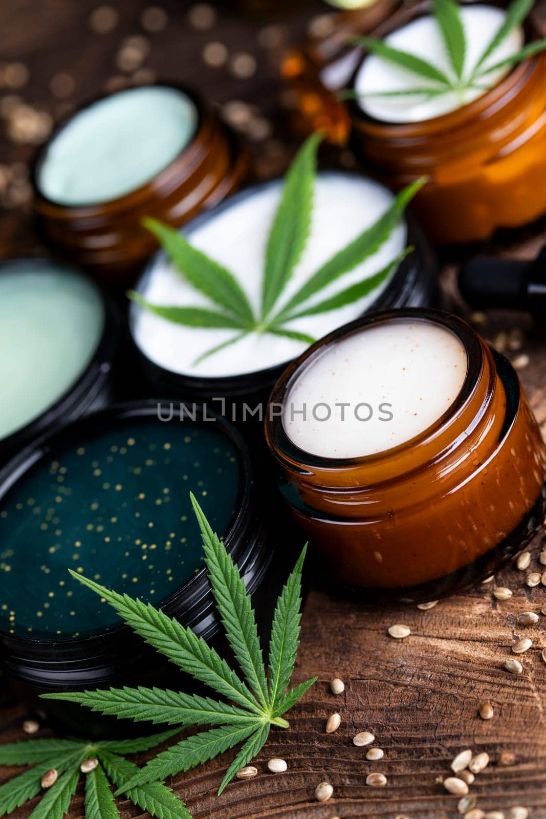 Cbd hemp cosmetics, oil in bottle and marijuana