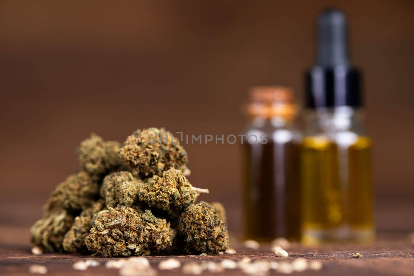 Cbd oil and marijuana plant, hemp seeds, medical marijuana concept