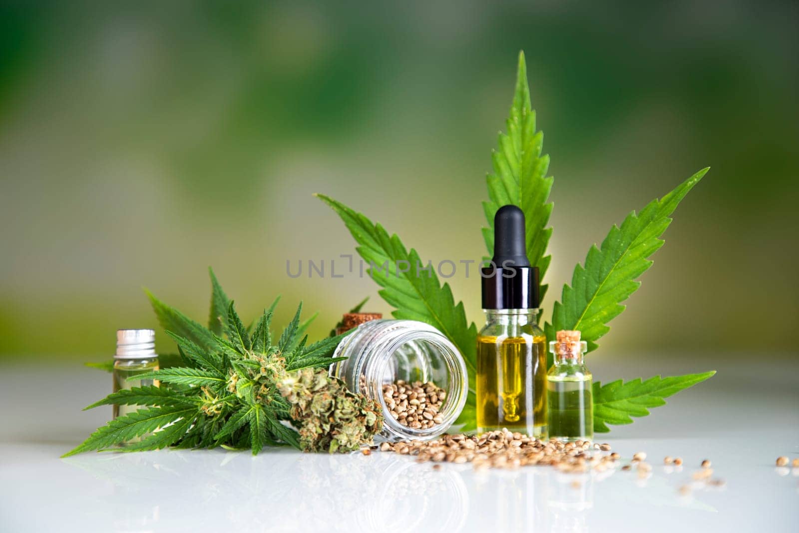 Oil cbd, cannabis and hemp leaves, medical marijuana concept