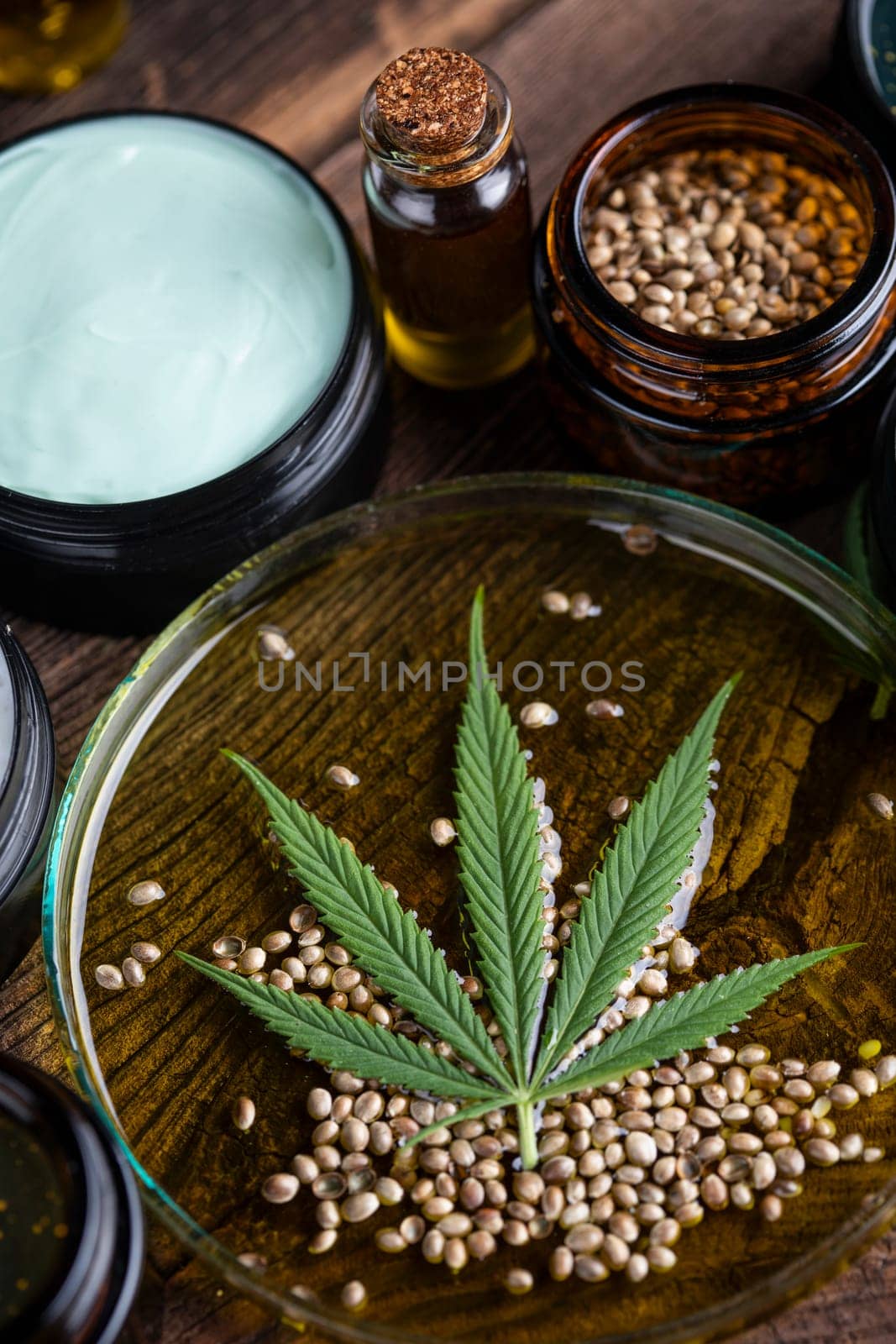 Cbd hemp cosmetics, oil in bottle and marijuana