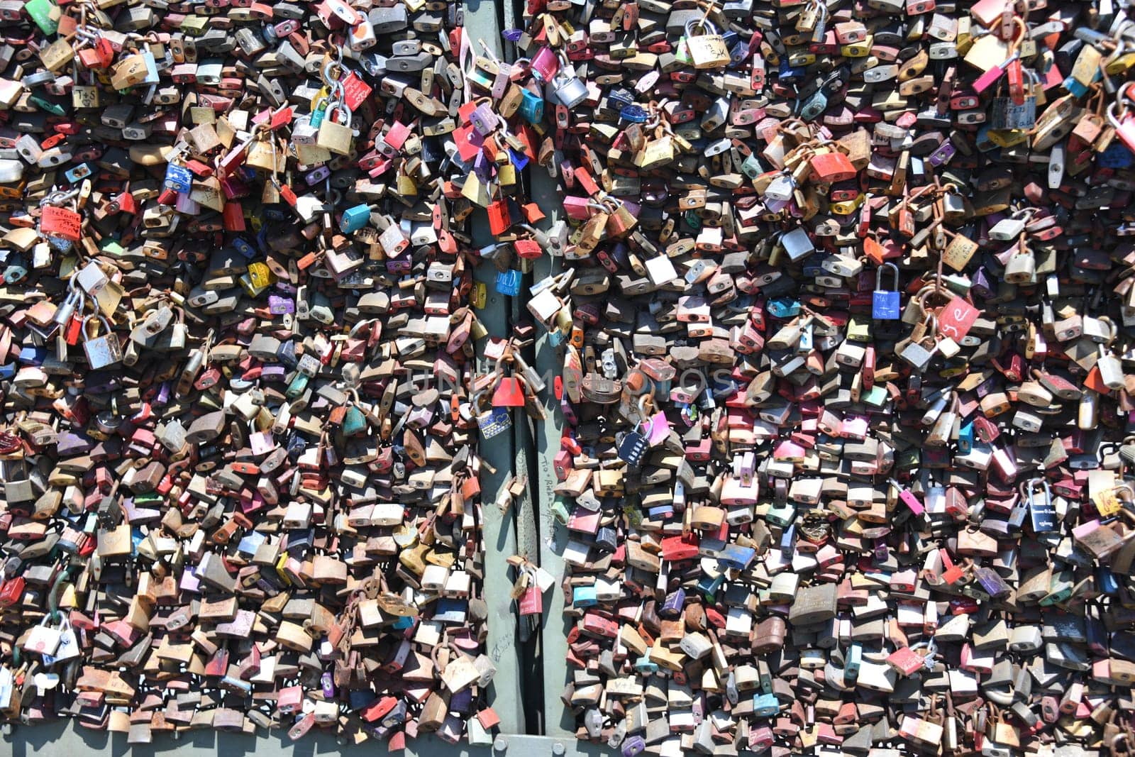Cologne,Hohenzollern Bridge,Germany. A love lock is a padlock that lovers traditionally attach to gates and bridges to symbolically seal their eternal love.