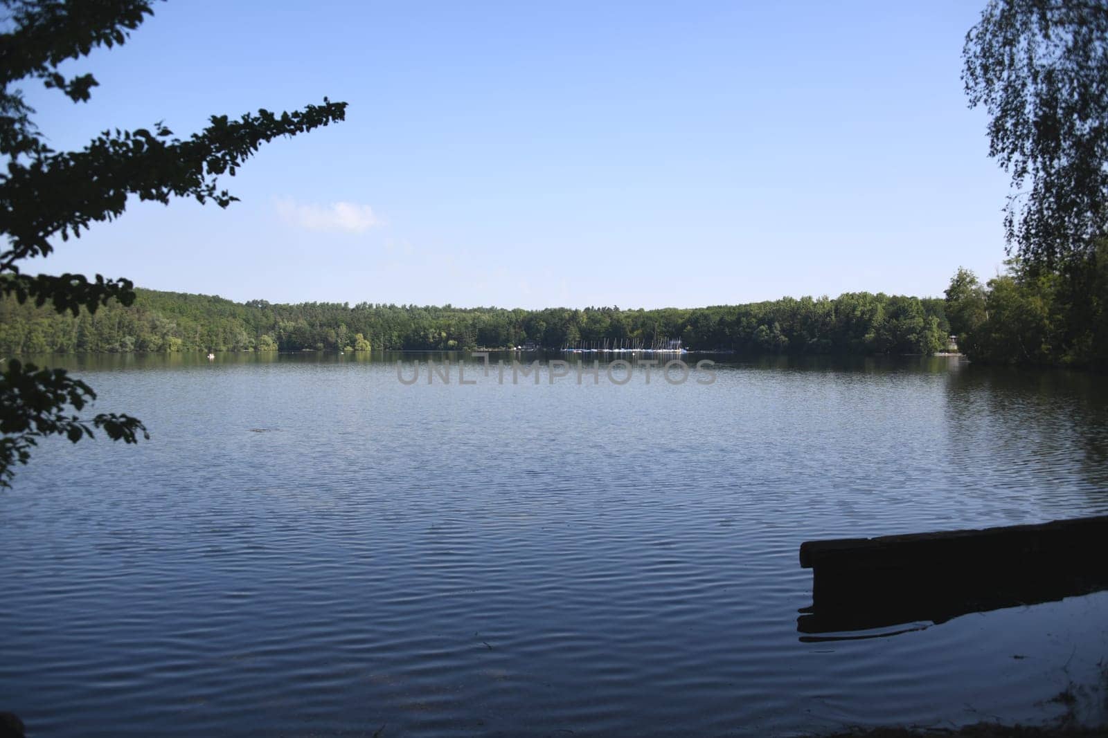 The Heider Bergsee is a bathing lake in the south of the Villeseenlandschaft near the town of Brühl near Cologne,North Rhine Westphalia,Germany. It was created artificially through renaturation as a local recreation area.