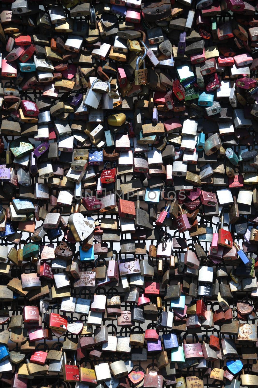 Cologne,Hohenzollern Bridge,Germany. A love lock is a padlock that lovers traditionally attach to gates and bridges to symbolically seal their eternal love.