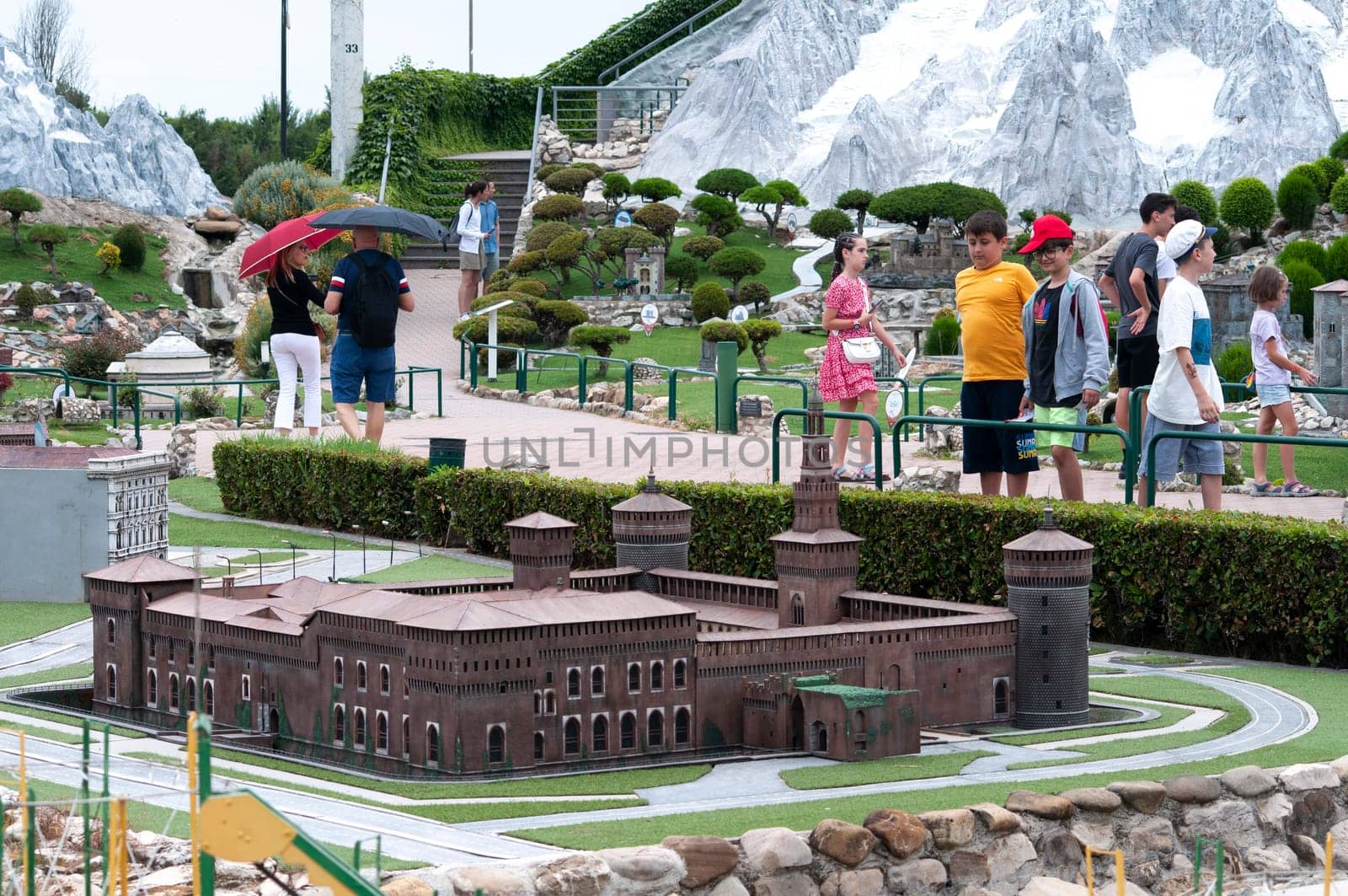 Viserba, Italy - June 25, 2024: People going at Theme park Italy in Miniature or Italia in Miniatura in Rimini, Italy - Reproduction of famous attractions in a small scale