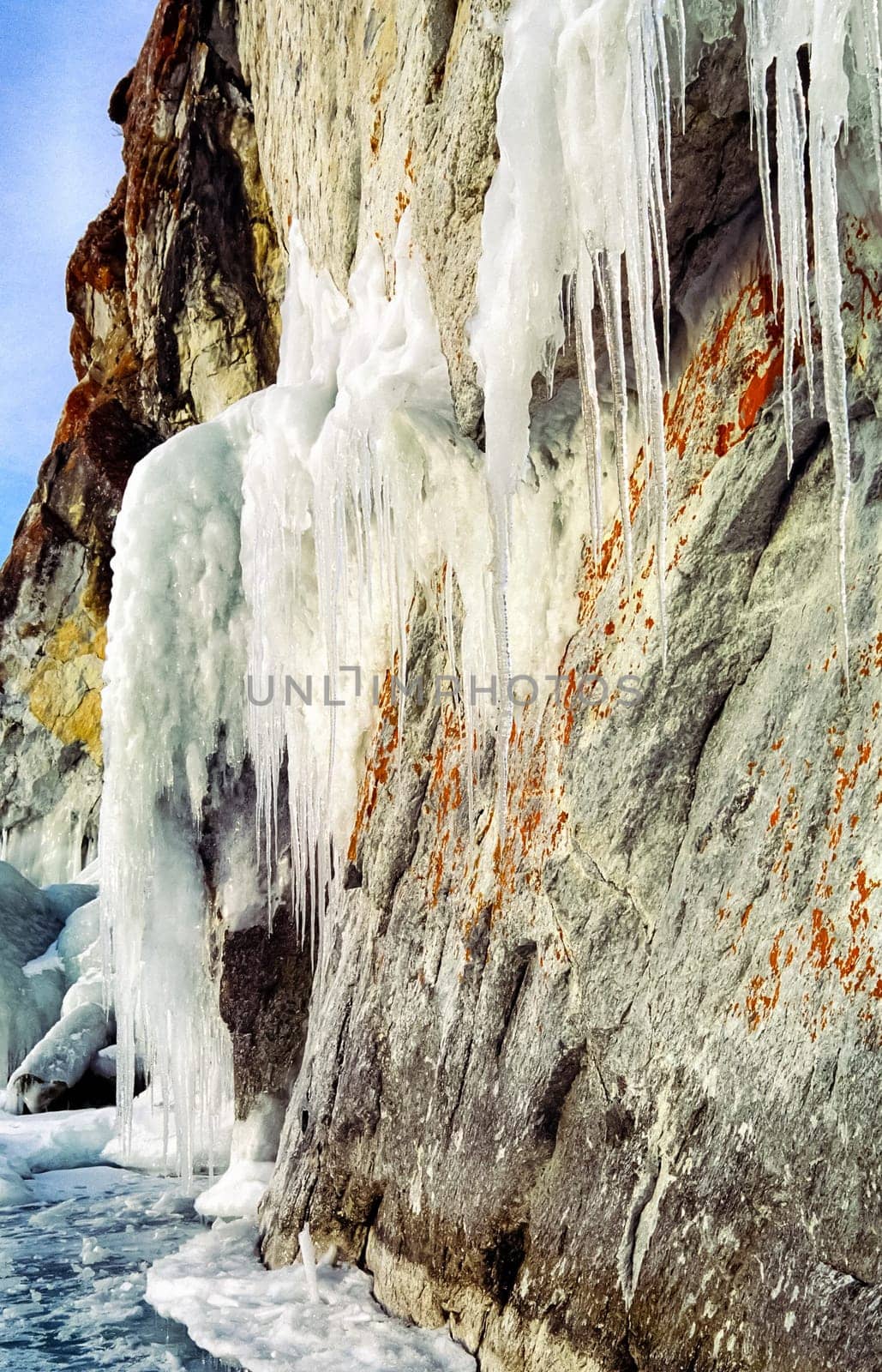 Winter on the Baikal, ice and snow on the lake. The beauty of the nature of Baikal in winter.