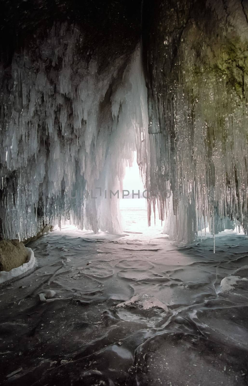 Winter on the Baikal, ice and snow on the lake. The beauty of the nature of Baikal in winter.