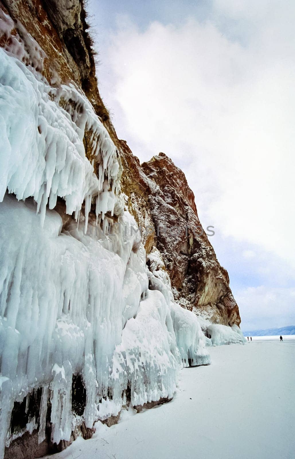 Winter on the Baikal, ice and snow on the lake. The beauty of the nature of Baikal in winter.