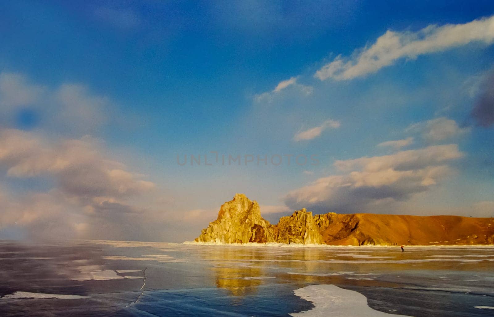 Winter on the Baikal, ice and snow on the lake. The beauty of the nature of Baikal in winter.