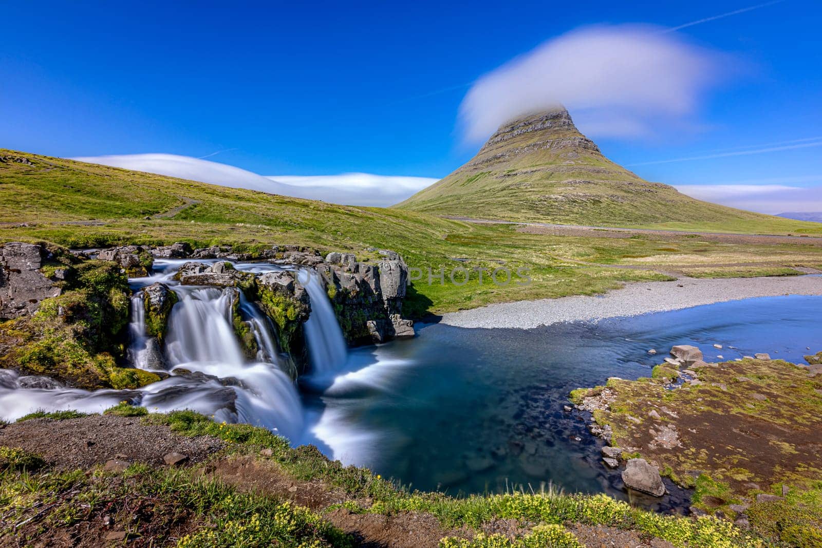 Waterfalls  river  kirkjufell mountain background snaefellsnes peninsula iceland