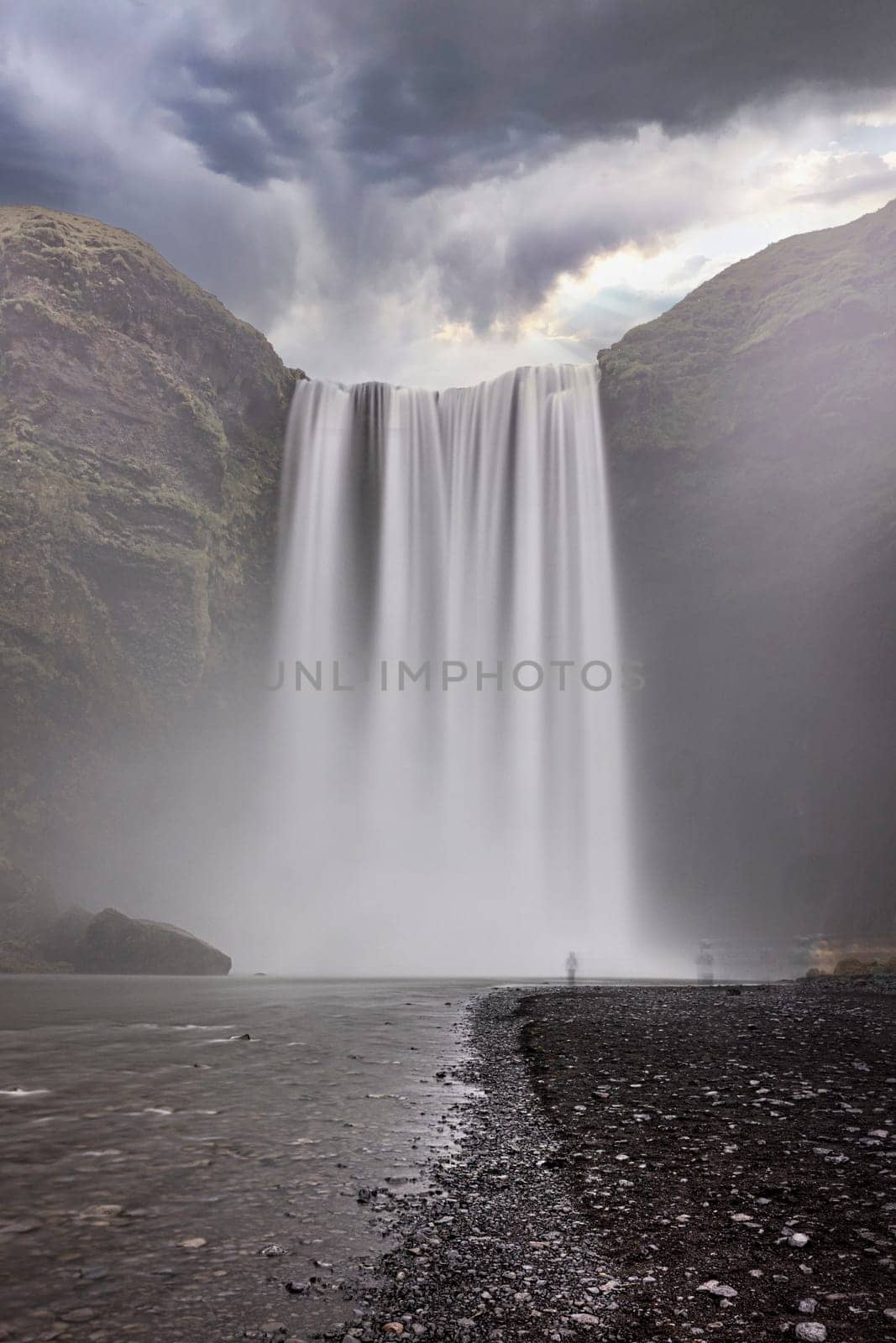 skogafoss, majestic waterfall in iceland long exposure shot