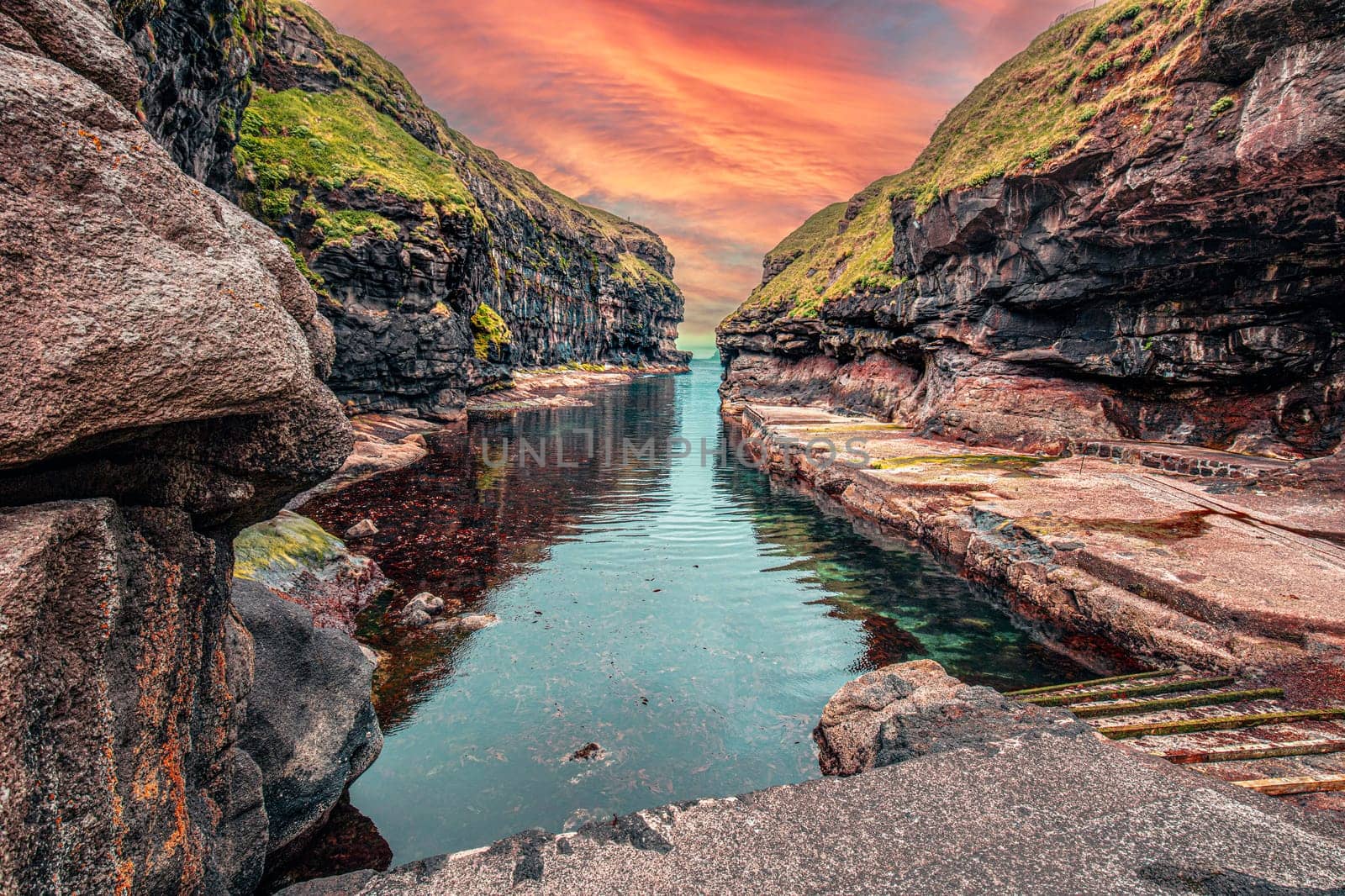 view  ocean inlet  village  gjogv, faroe islands,  dramatic sky rock formations