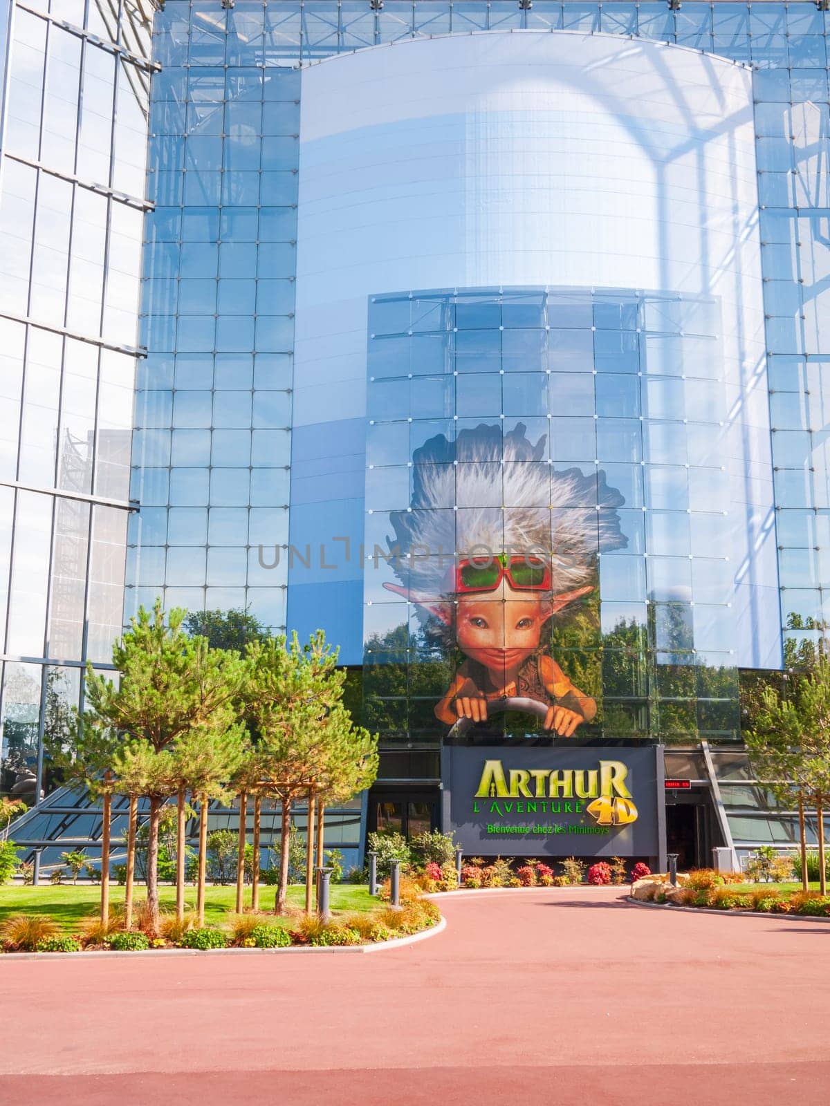 Poitiers, France - September 18 2010: Arthur, the 4D adventure. Glass building in Futuroscope, a French amusement park that lets you experience sounds, images, and sensations