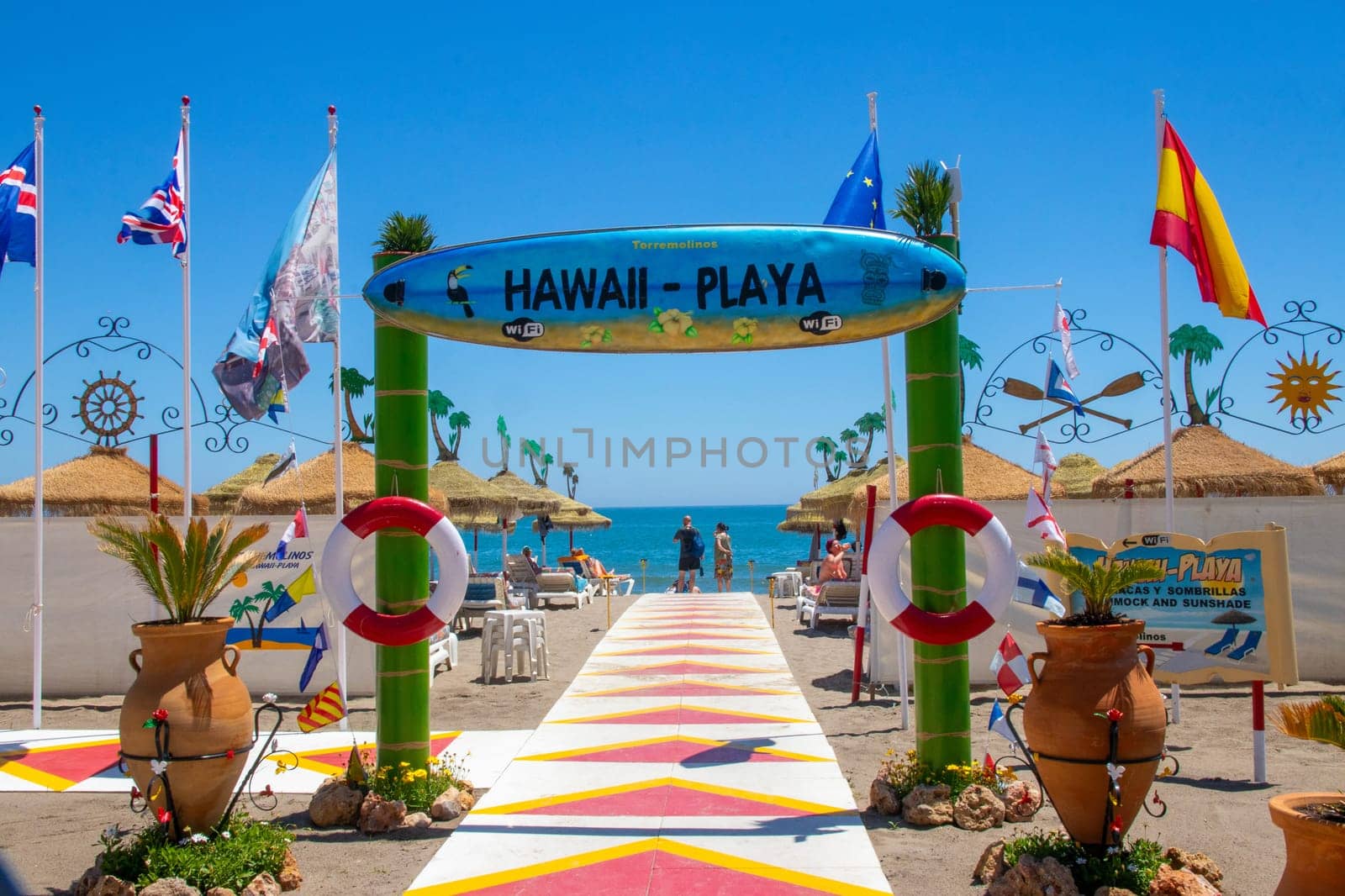 TORREMOLINOS, SPAIN, Andalusia 21 May 2019. Flags at the entrance to Playa Hawai beach in Torremolinos, Malaga province.