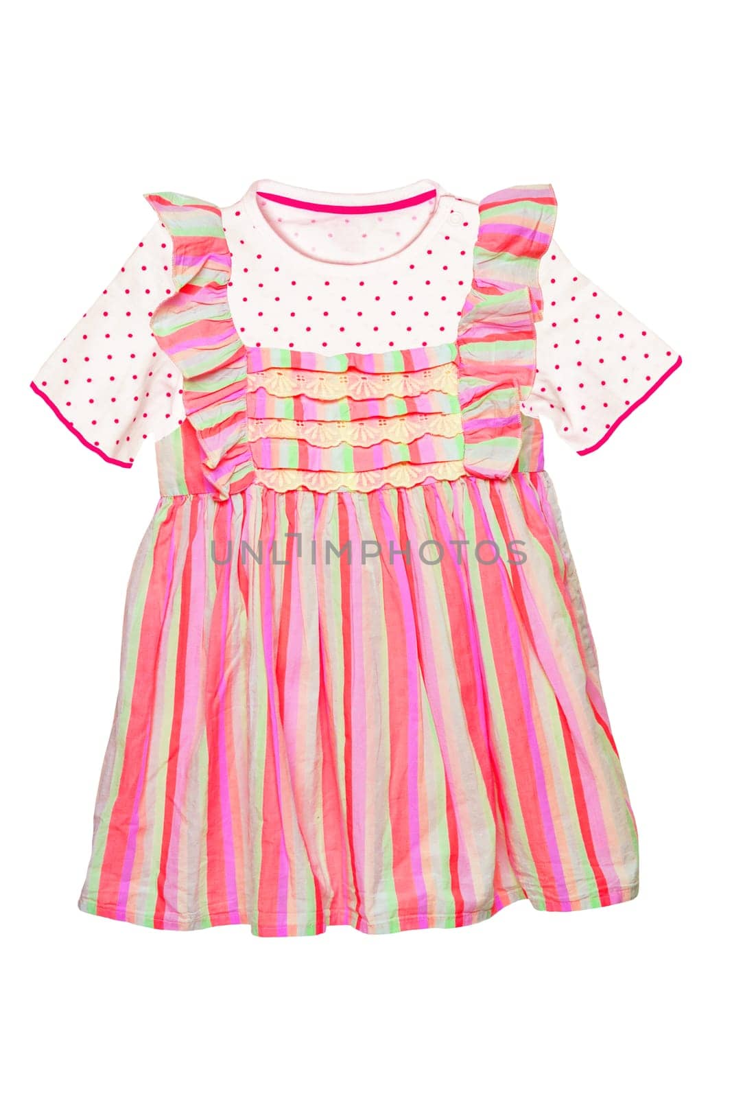 Summer dress isolated. Closeup of a beautiful colorful baby girl dress and a white shirt with dots isolated on a white background. Children spring fashion.