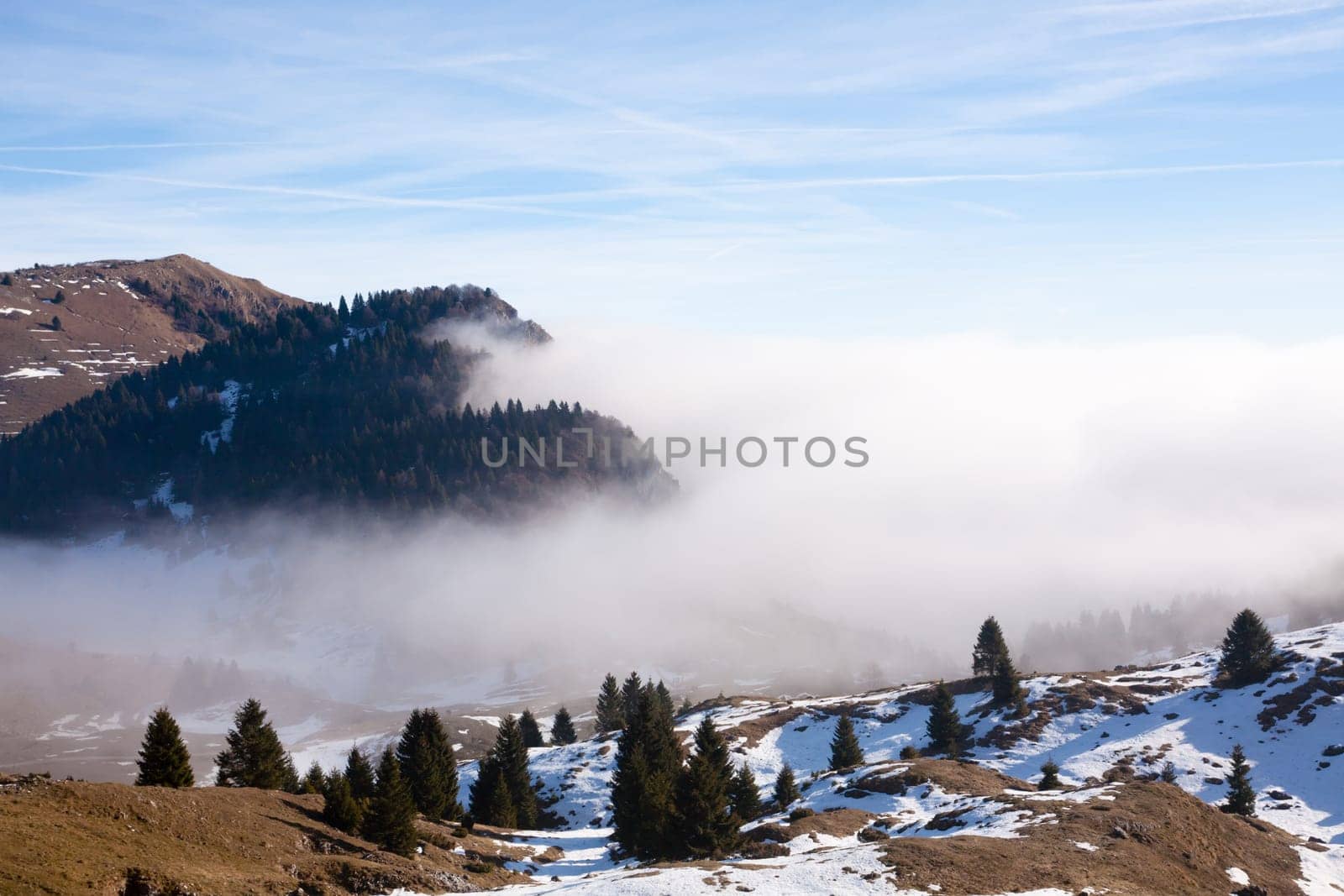 Italian Alps winter landscape with snow, Grappa mount